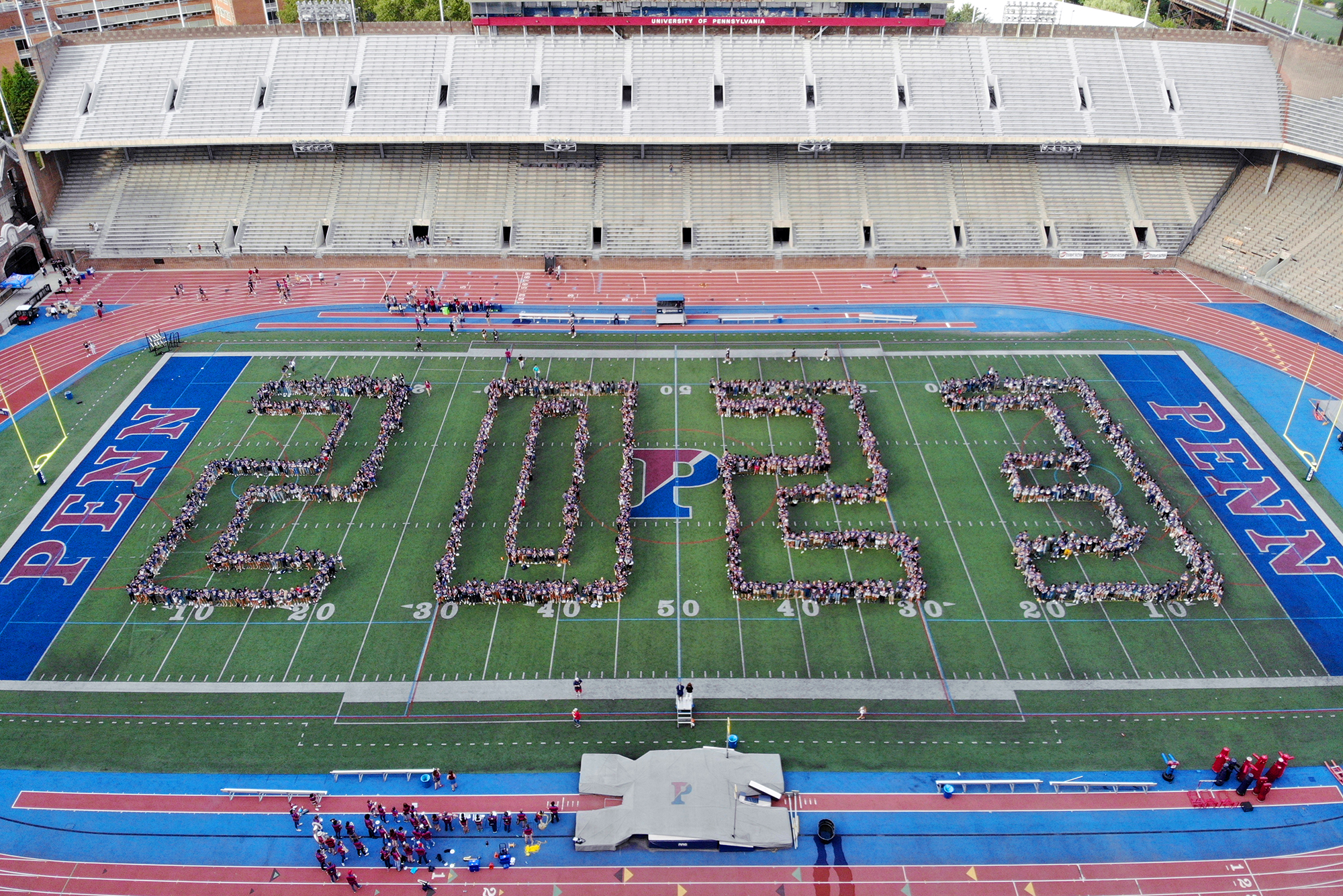 Aerial view of Franklin Field with bodies in formation spelling out 2023.