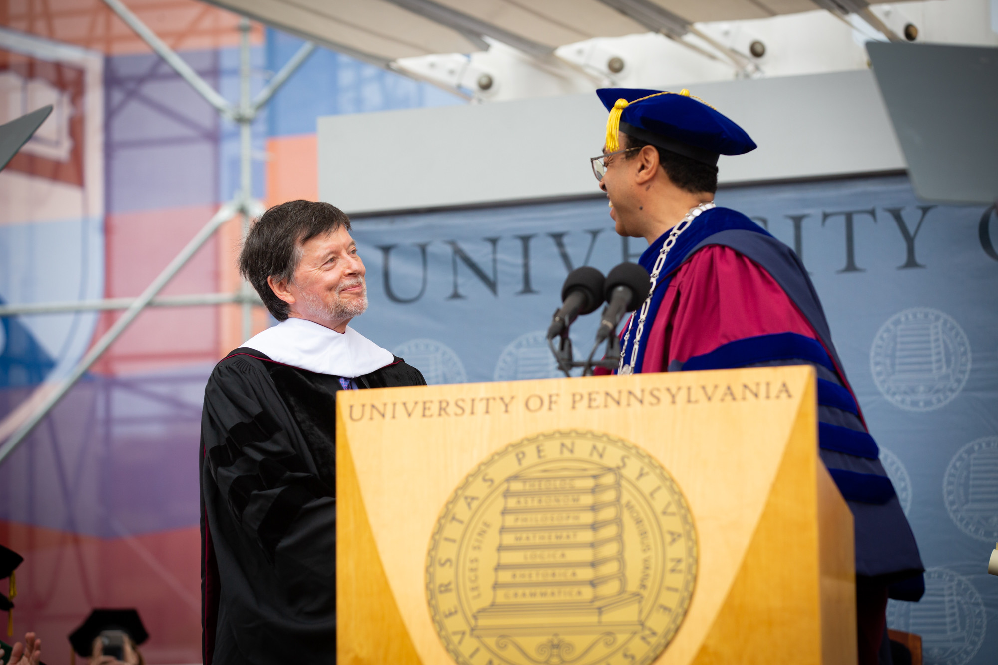 Ken Burns is welcomed to the podium to deliver his address by Interim Provost Wendell Pritchett