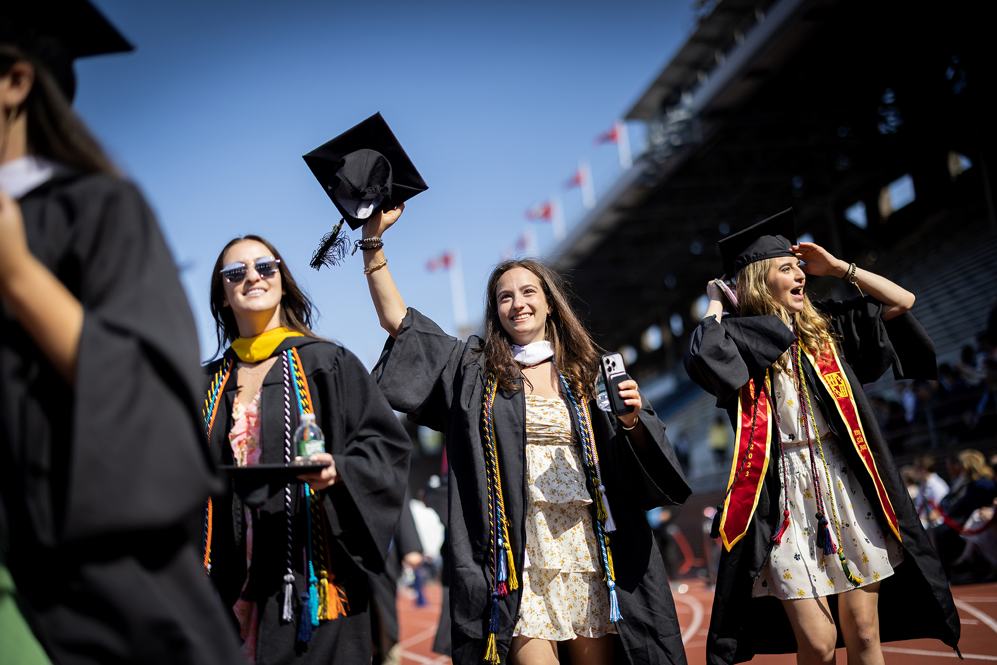 students walking into franklin field during commencement