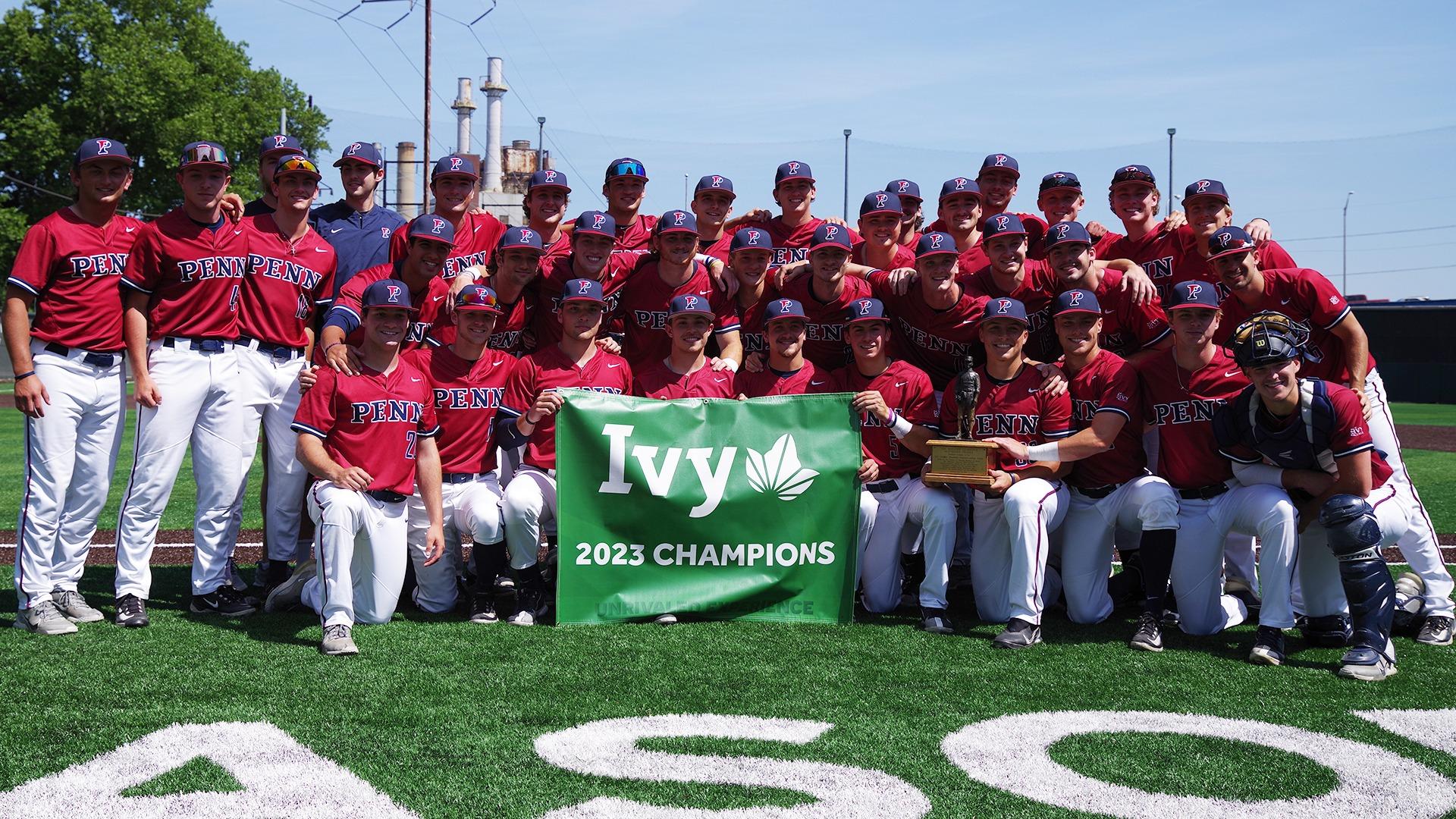 the baseball team posed behind banner, ivy 2023 champions