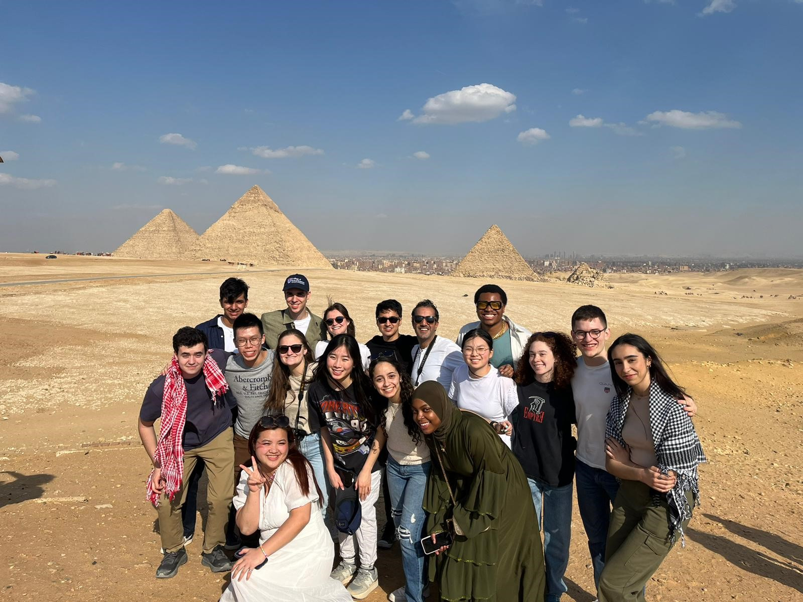 A group of Penn students visit the pyramids at Giza