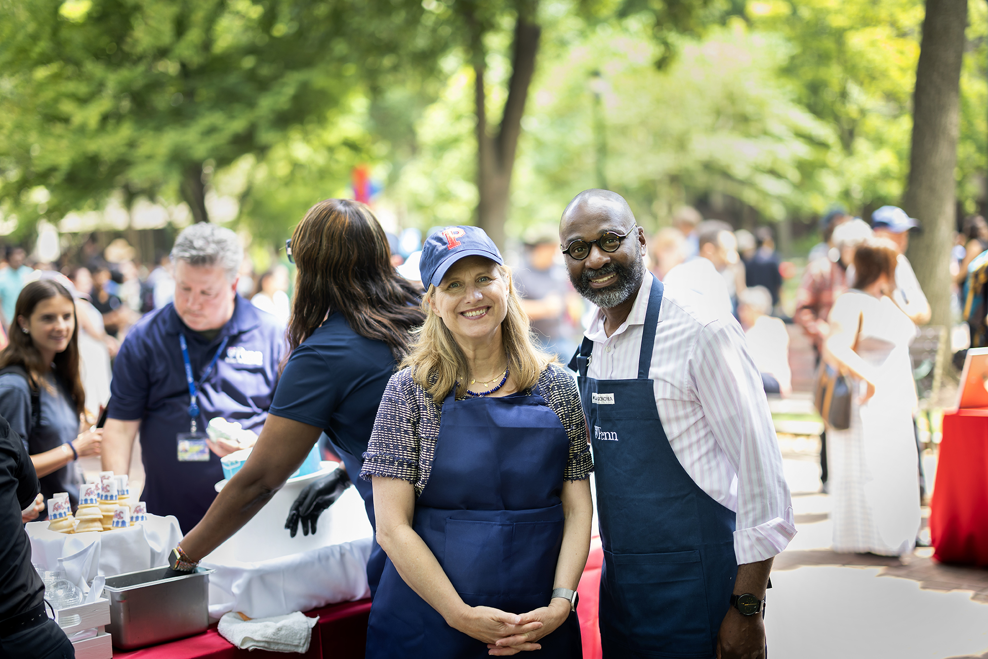 Liz Magill and John L. Jackson Jr. at the Ice Cream Social on College Green.