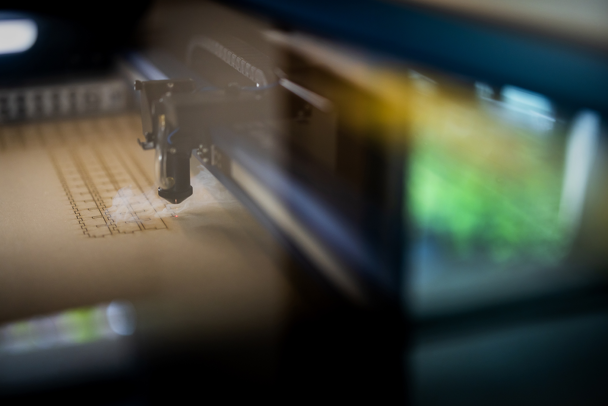 close up image of the laser cutter at the biotech commons