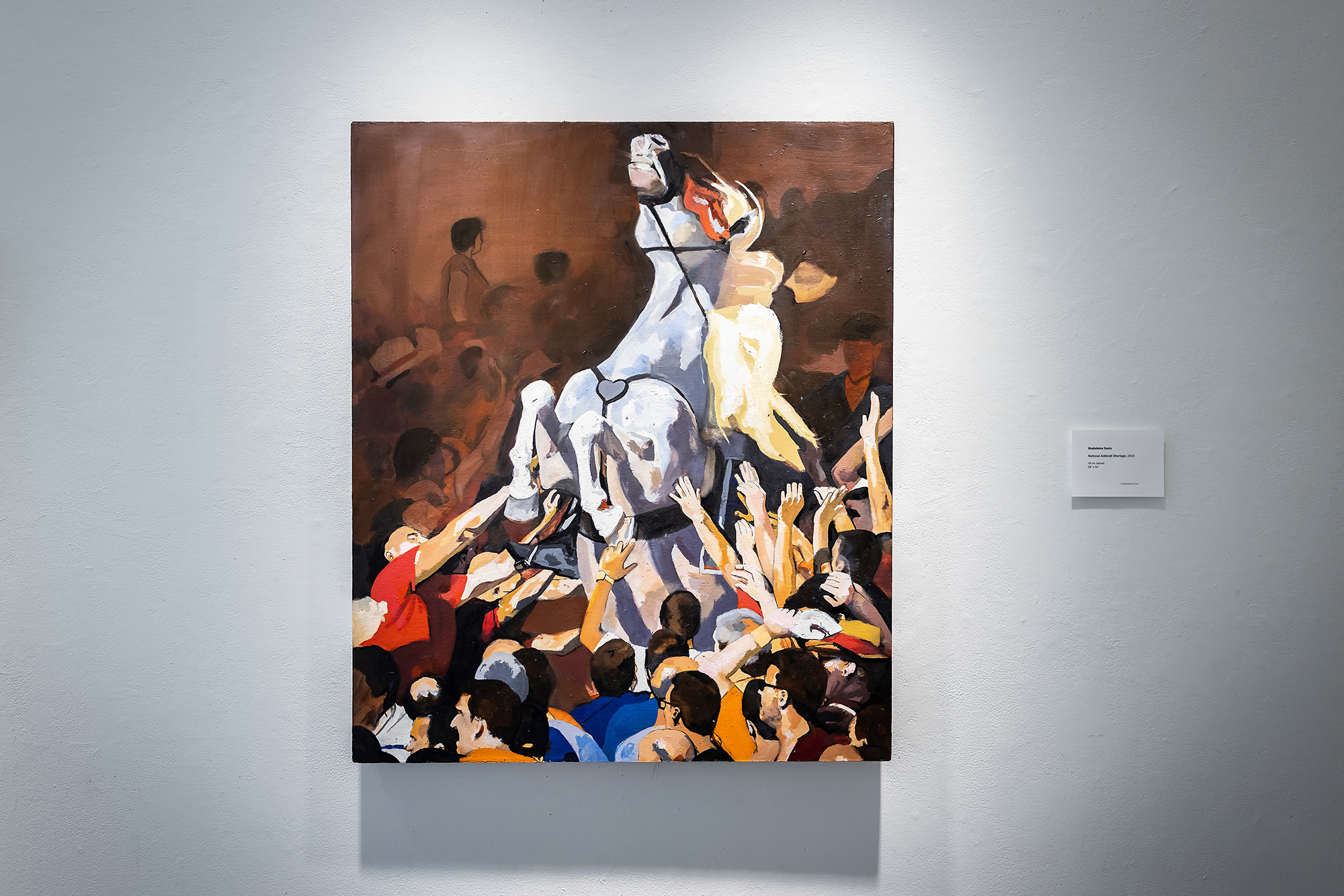 artwork depicting rearing horse with crowd below with upstretched arms