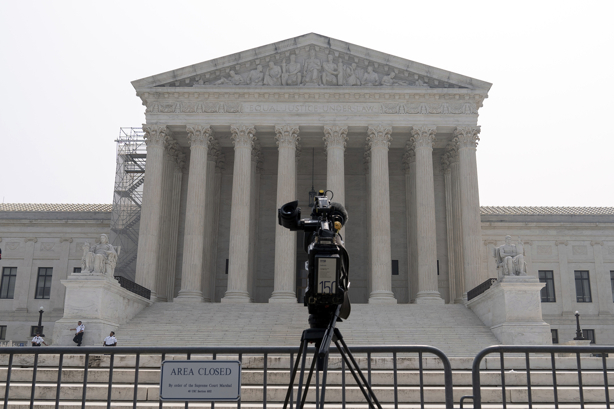 Supreme Court building with a video camera pointed at the front steps.