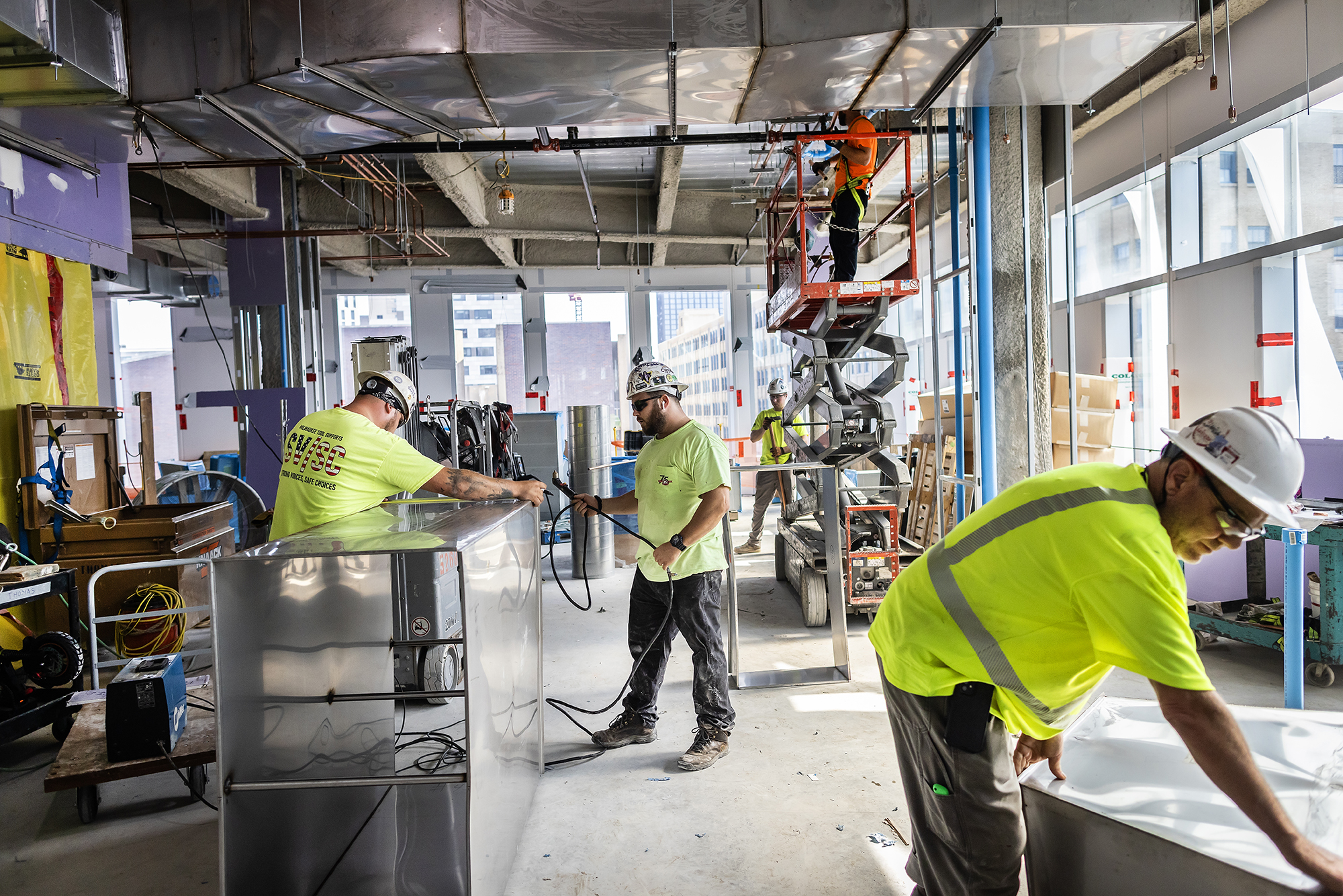 construction workers at the vagelos laboratory