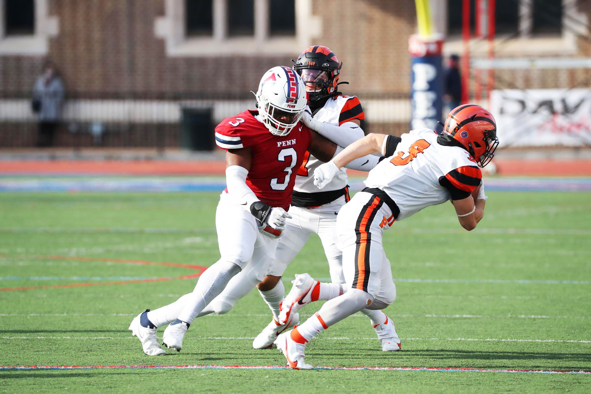 Jonathan Melvin chases down a Princeton ball carrier during a game at Franklin Field.