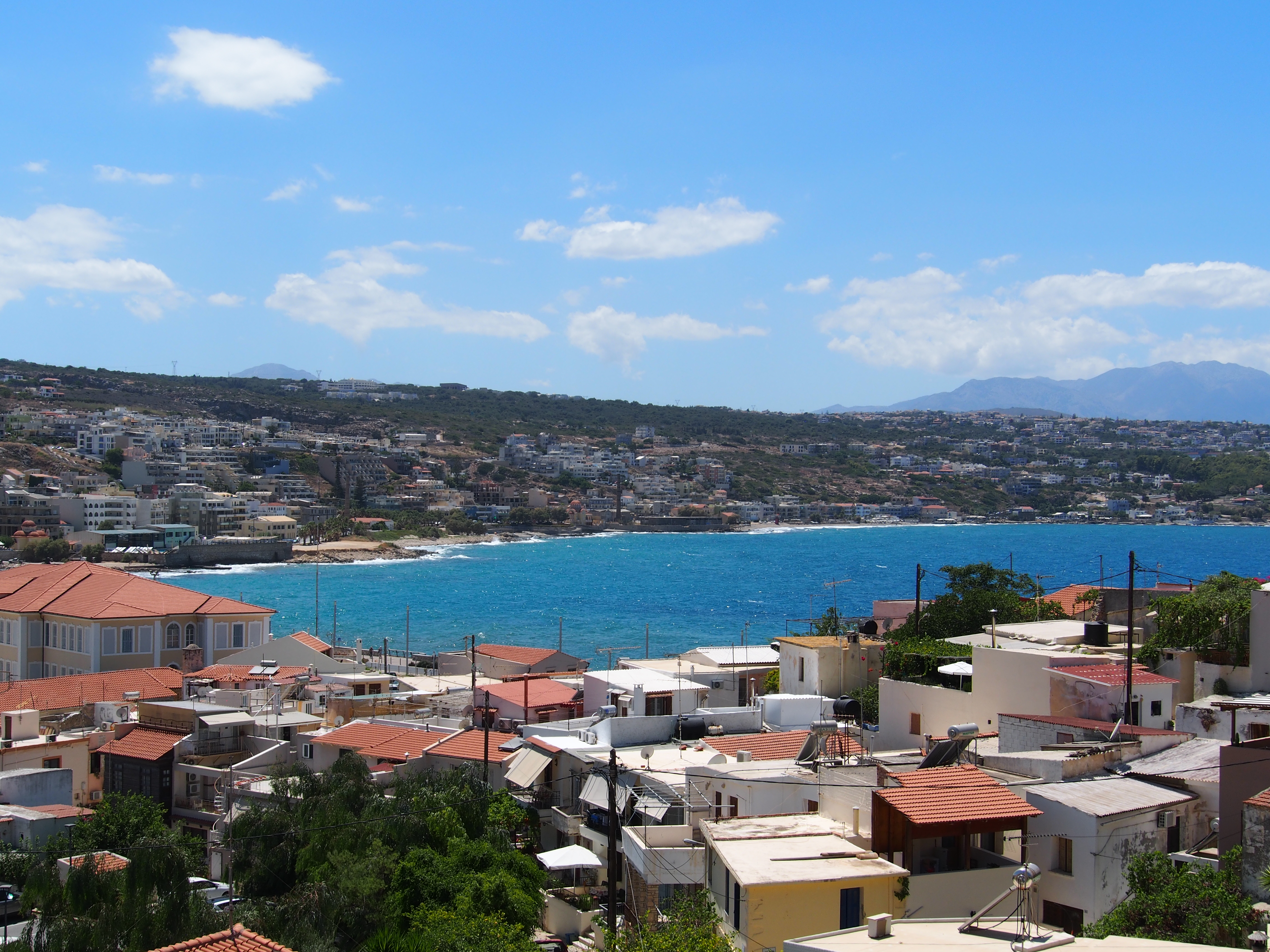 Photograph of Cretian landscape overlooking a body of water.