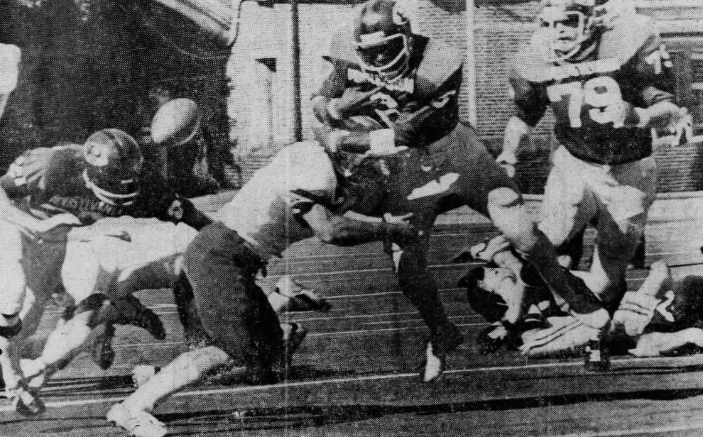 Penn running back Adolph Bellizeare, hit by Brown’s Jamie Kiernan, loses the ball, one of six Quaker fumbles on the day.