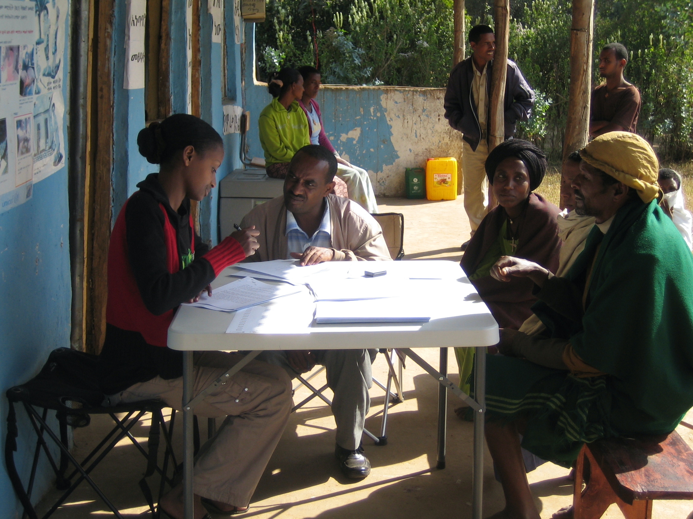 Researchers collecting ethnographic and medical information from participants in Ethiopia.
