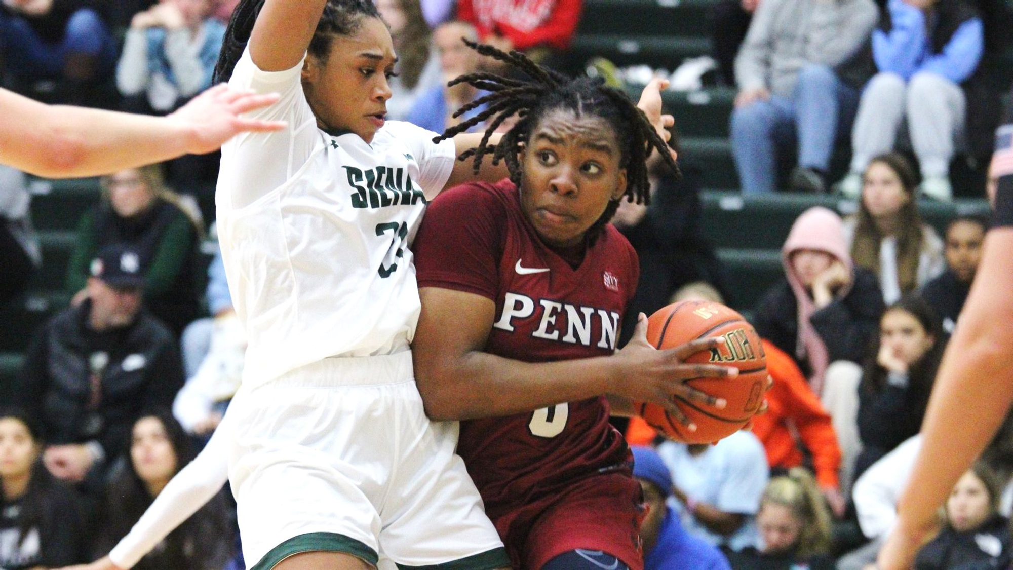 Forward Jordan Obi makes a move with the ball against Siena in New York.