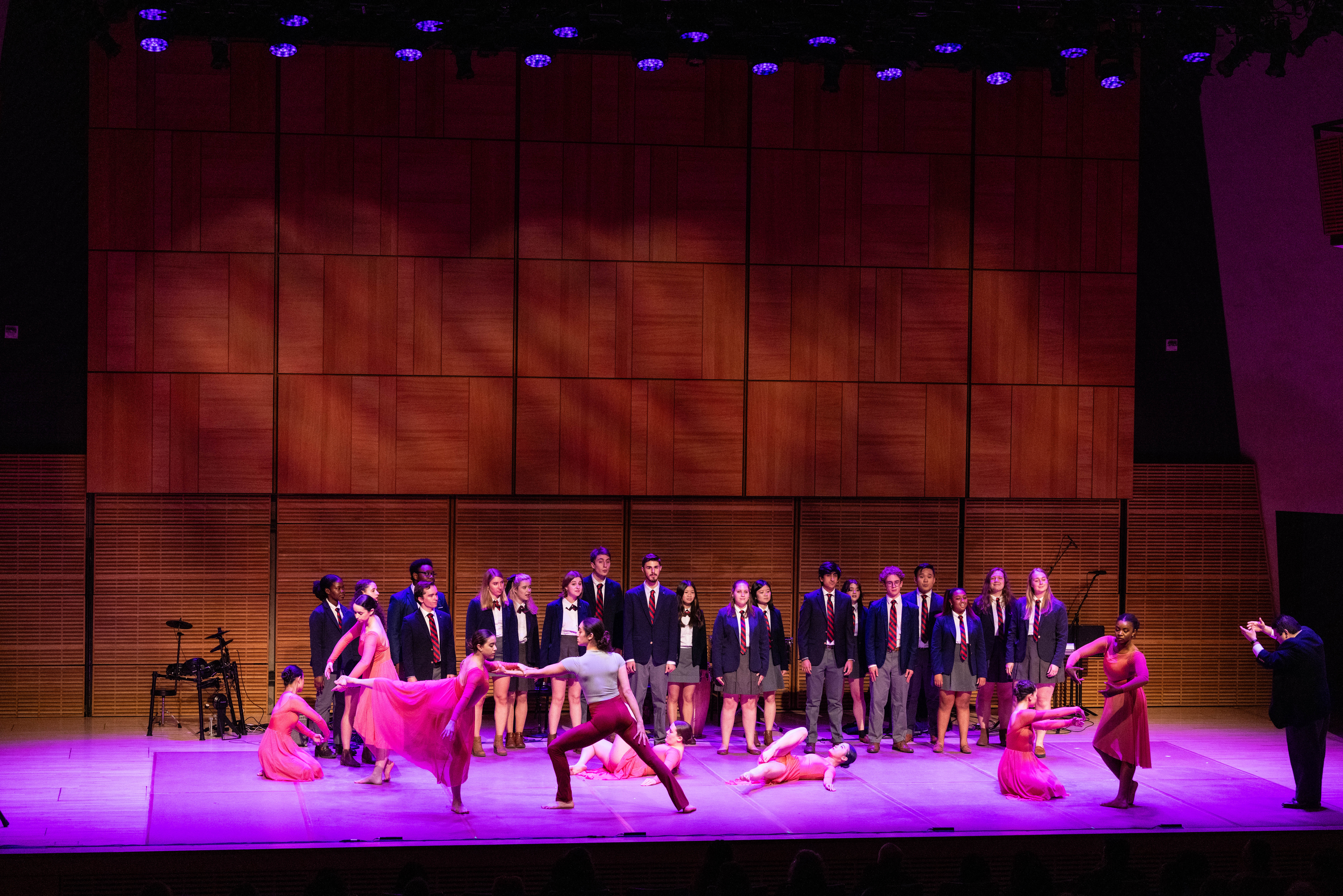 Penn Glee Club and Penn Dance Company performing on stage