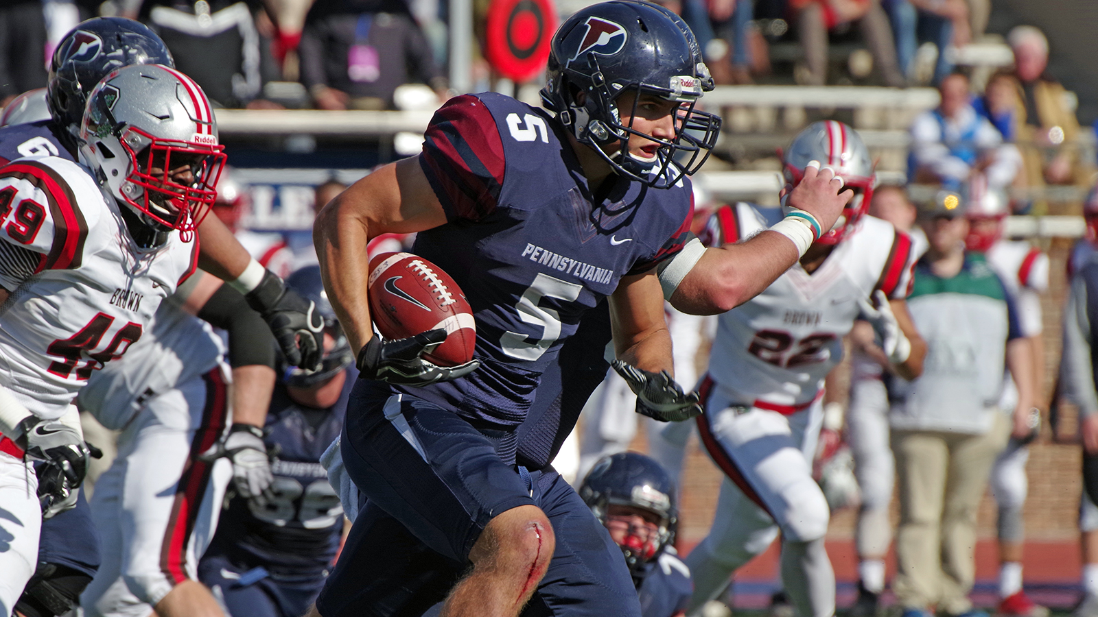 Justin Watson runs with the ball during his playing days at Penn.