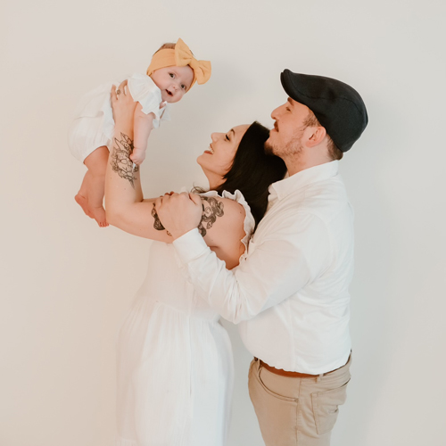 Eric Ezzi with his wife and baby.