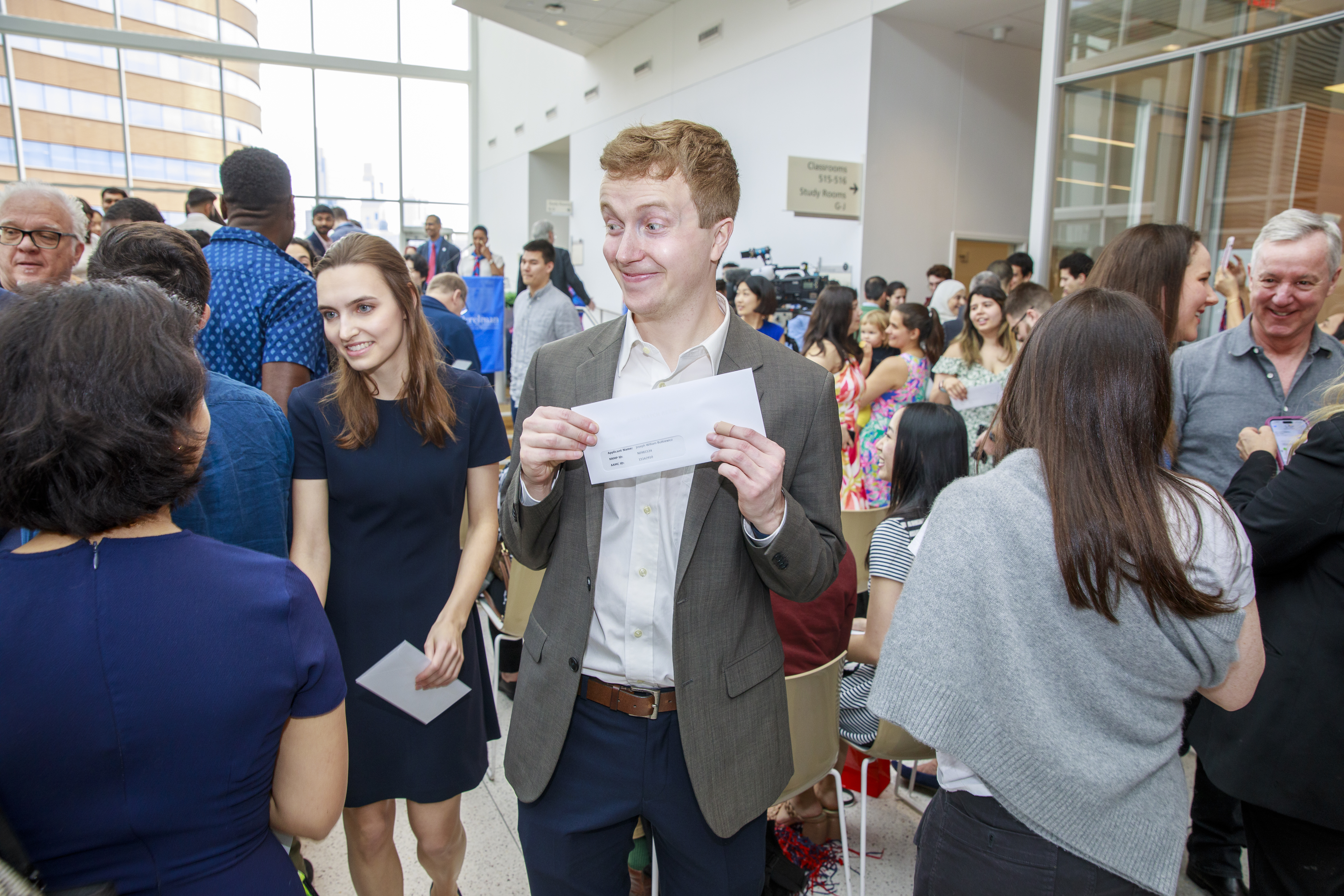 A Penn Med student holds their Match Day envelope.