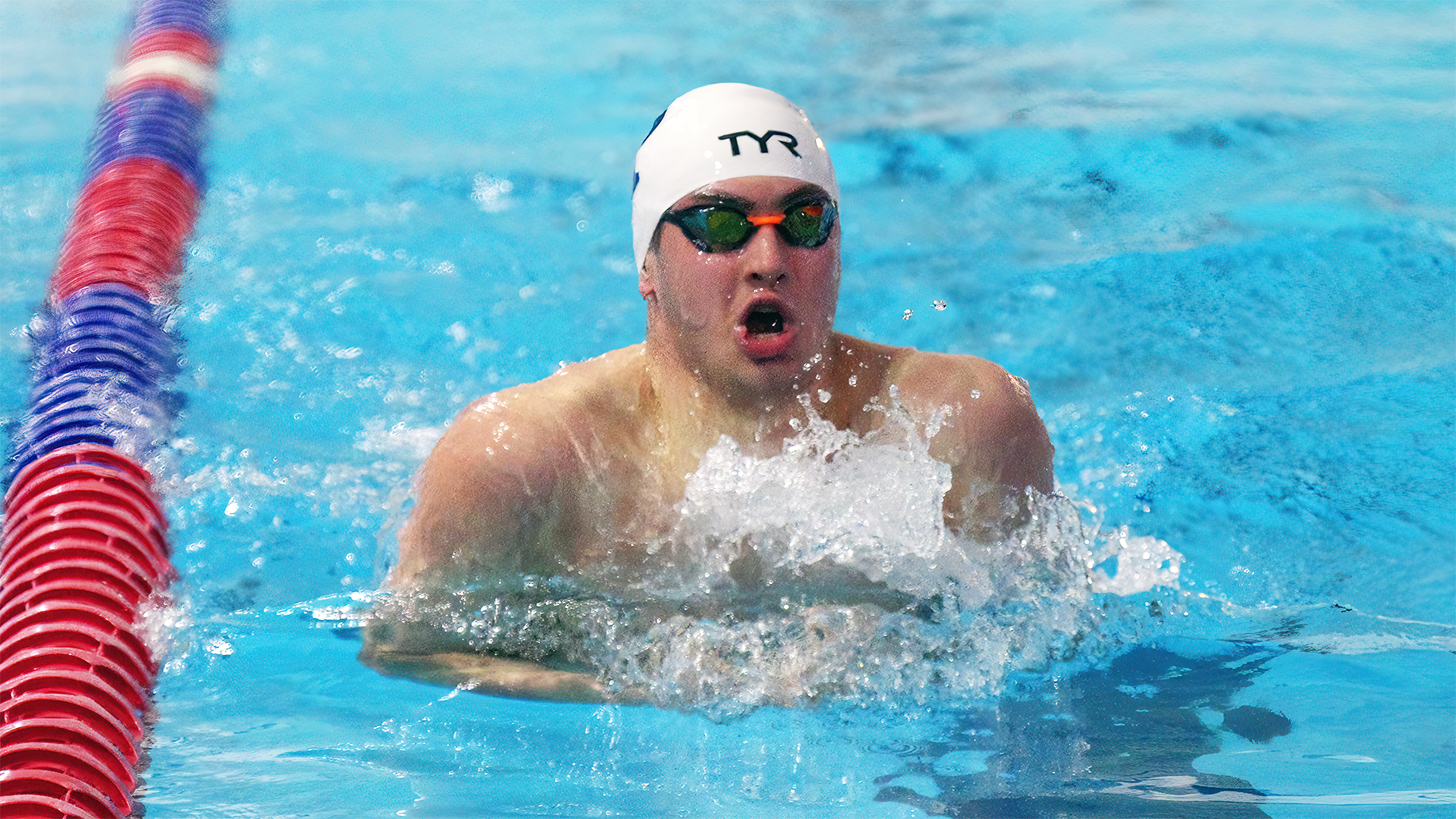 Matt Fallon performs the breaststroke during a meet.