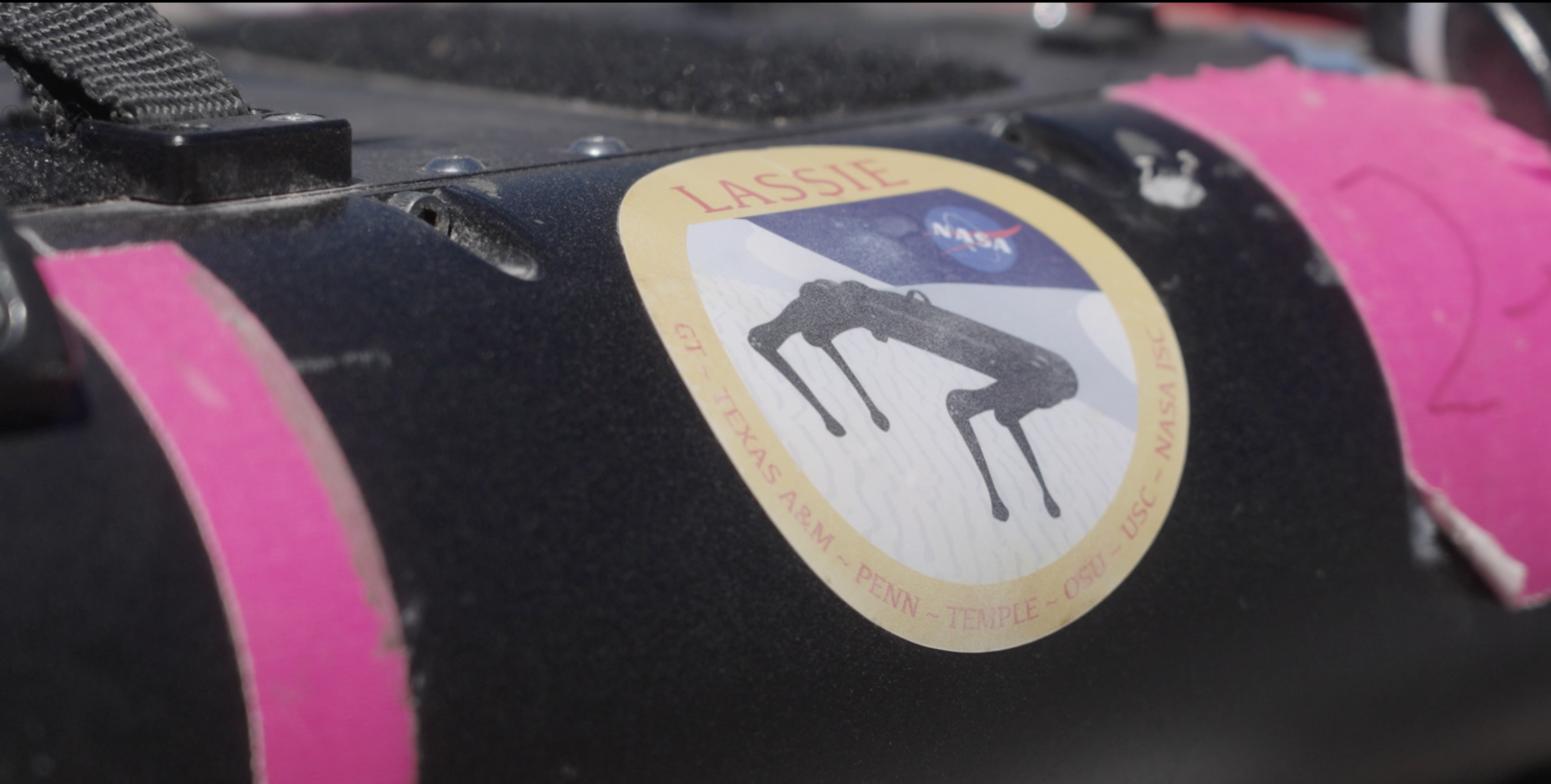 Close-up of NASA's LASSIE robot, logo in frame.