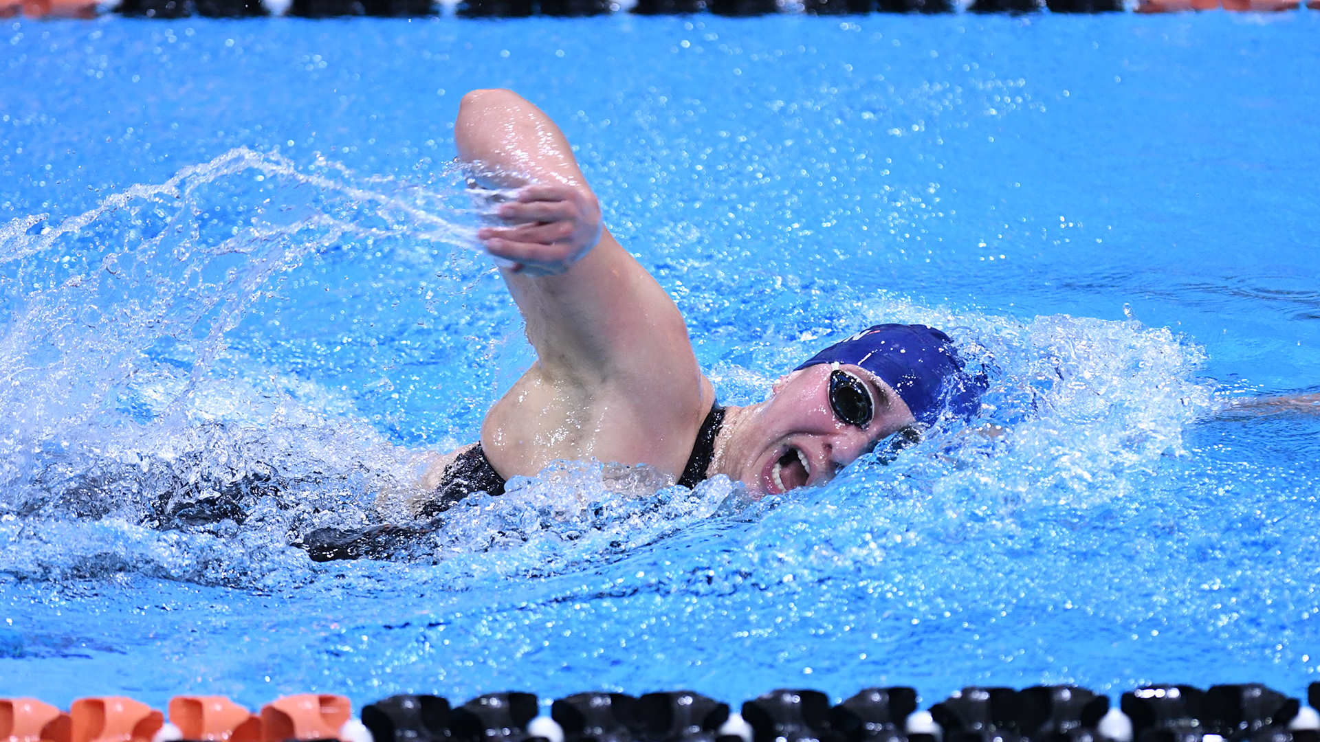 Anna Kalandadze takes a breath while swimming during a meet.