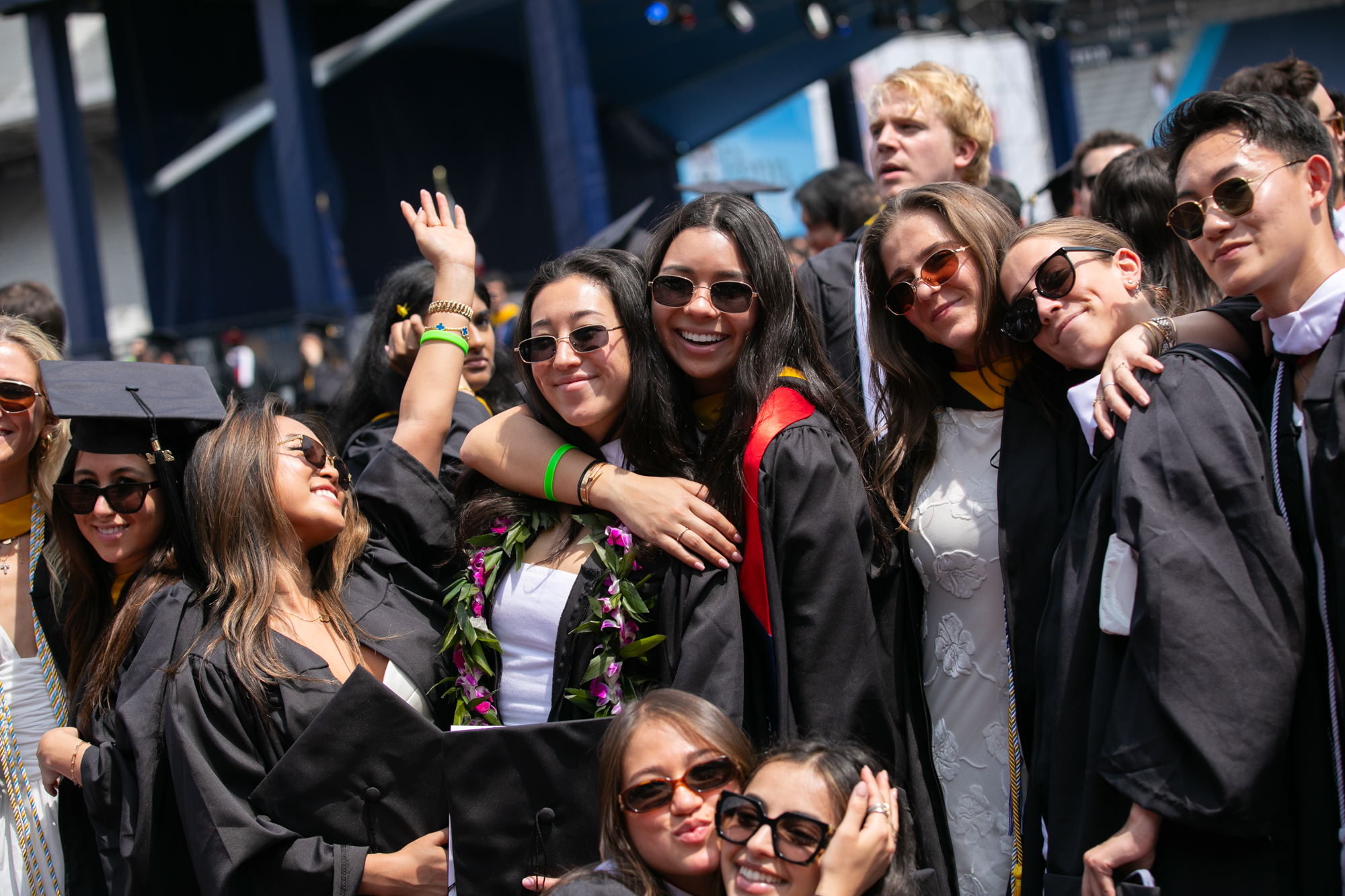 students celebrate after commencement