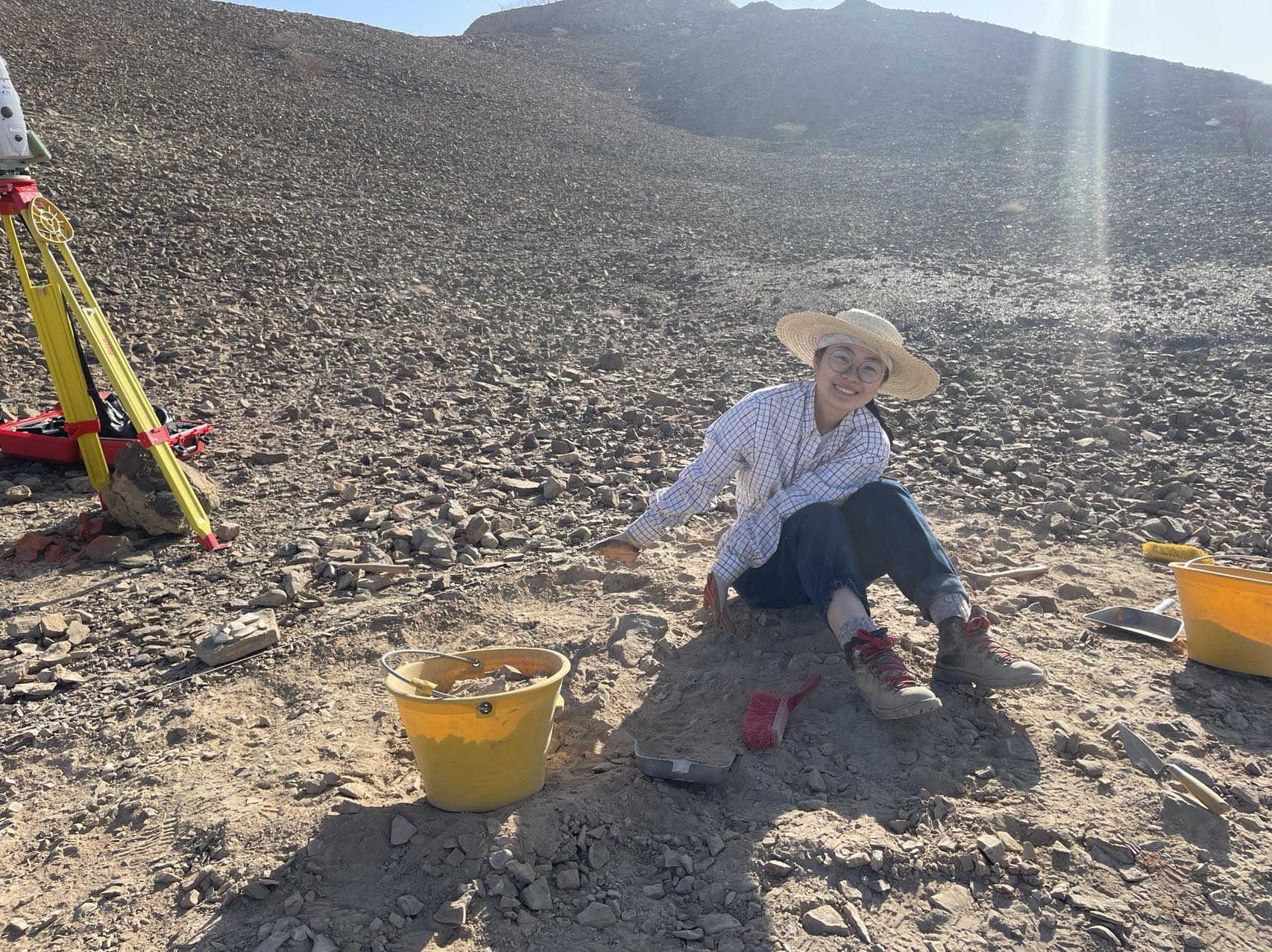 Qi Liu on excavation in Oman.