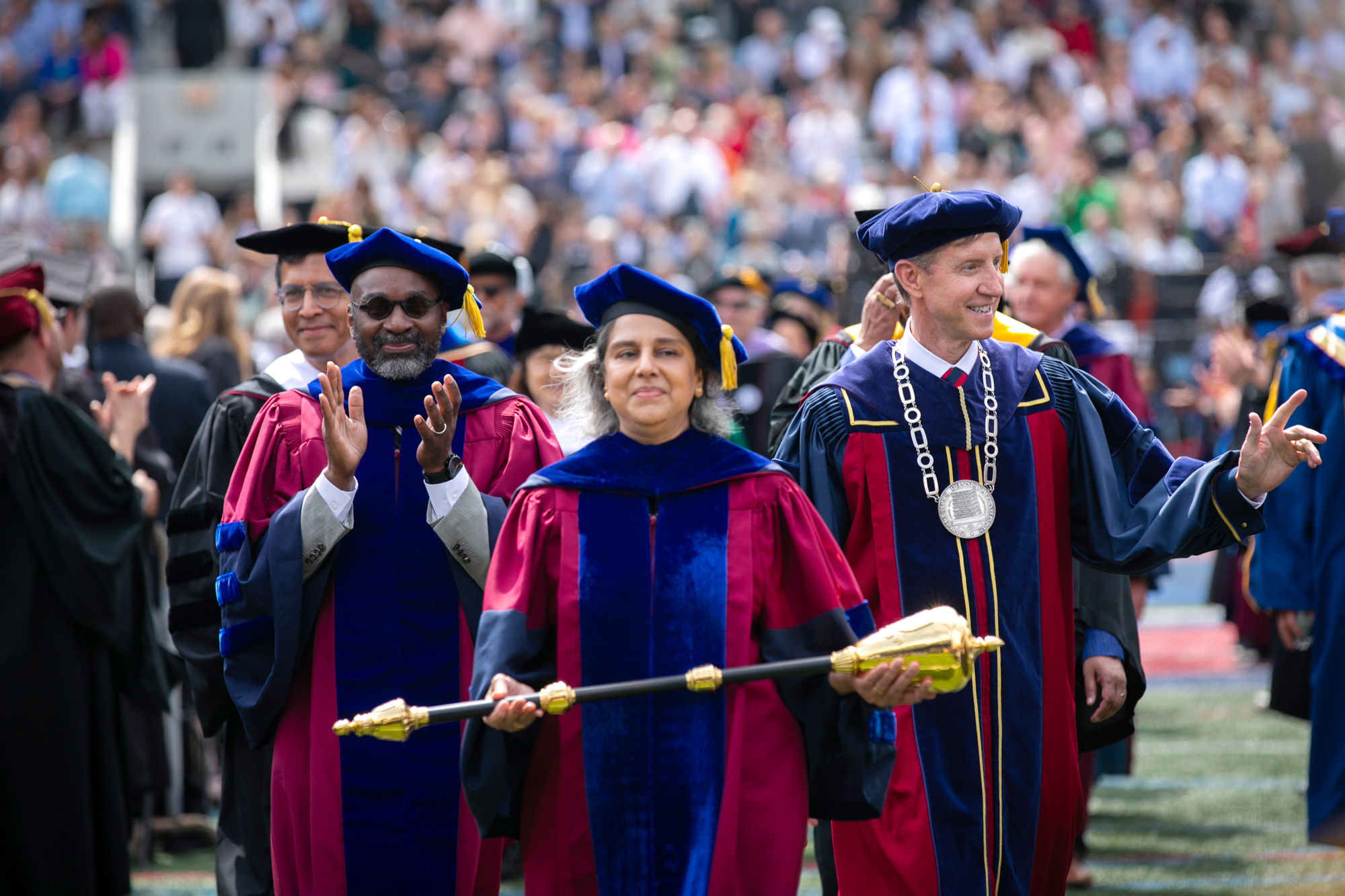 academic procession makes their way onto franklin field during commencement