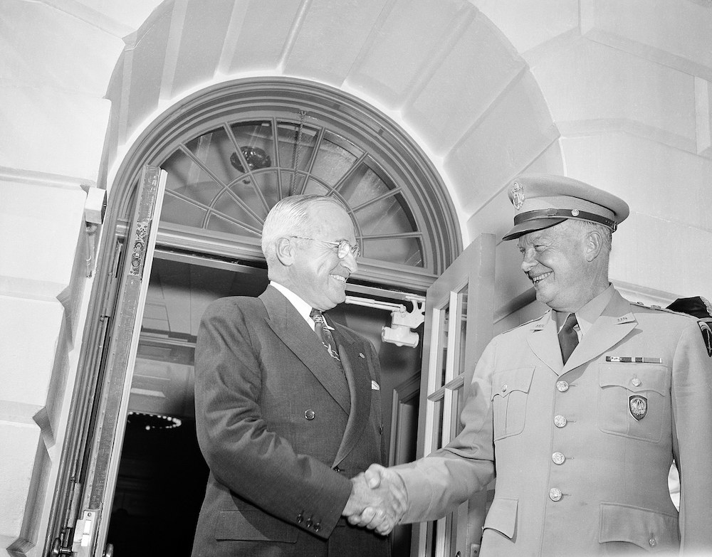 President Harry Truman shakes hands with Gen. Dwight Eisenhower at the White House on June 1, 1952.