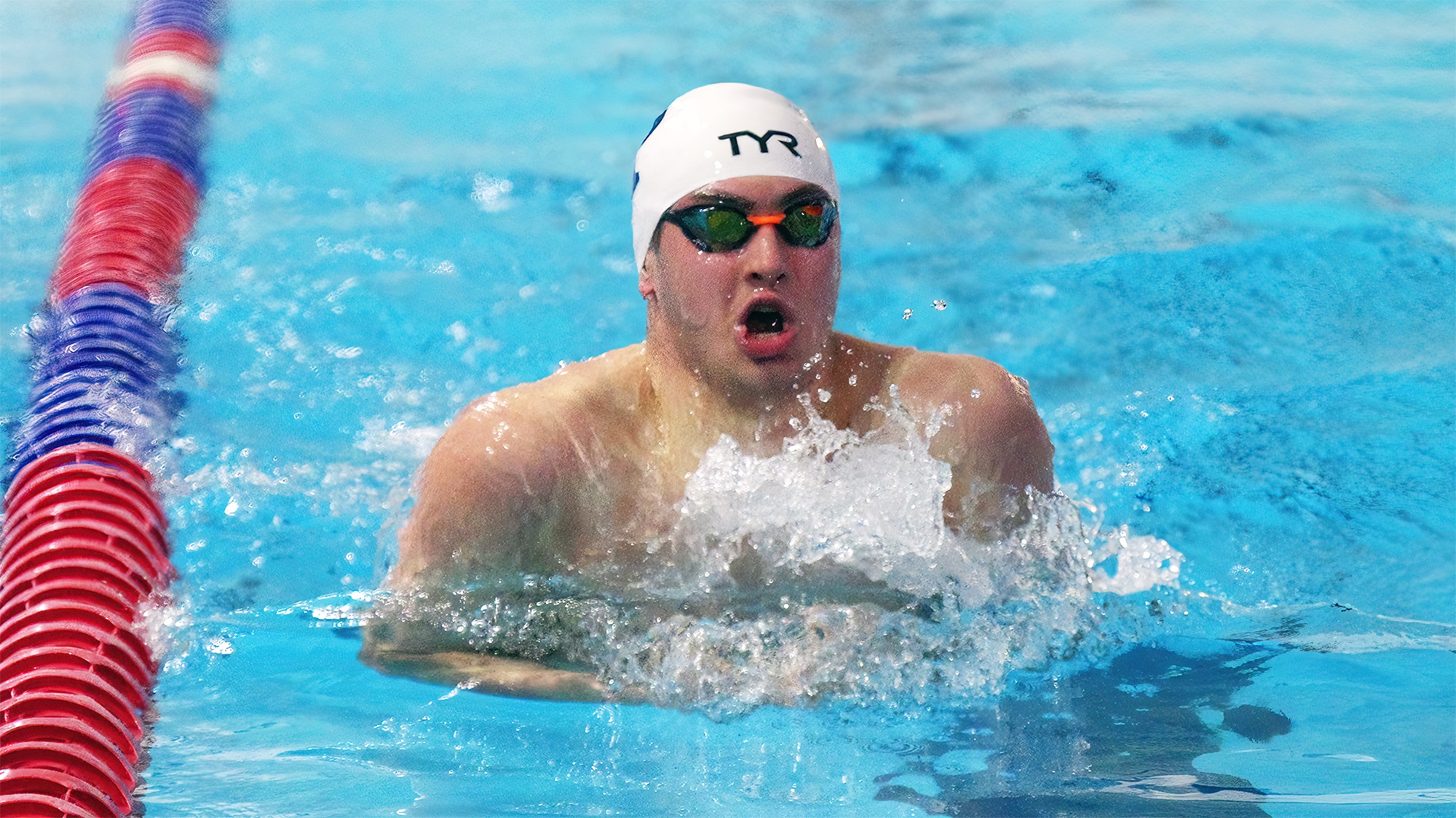 Matt Fallon performs the breaststroke during a race.