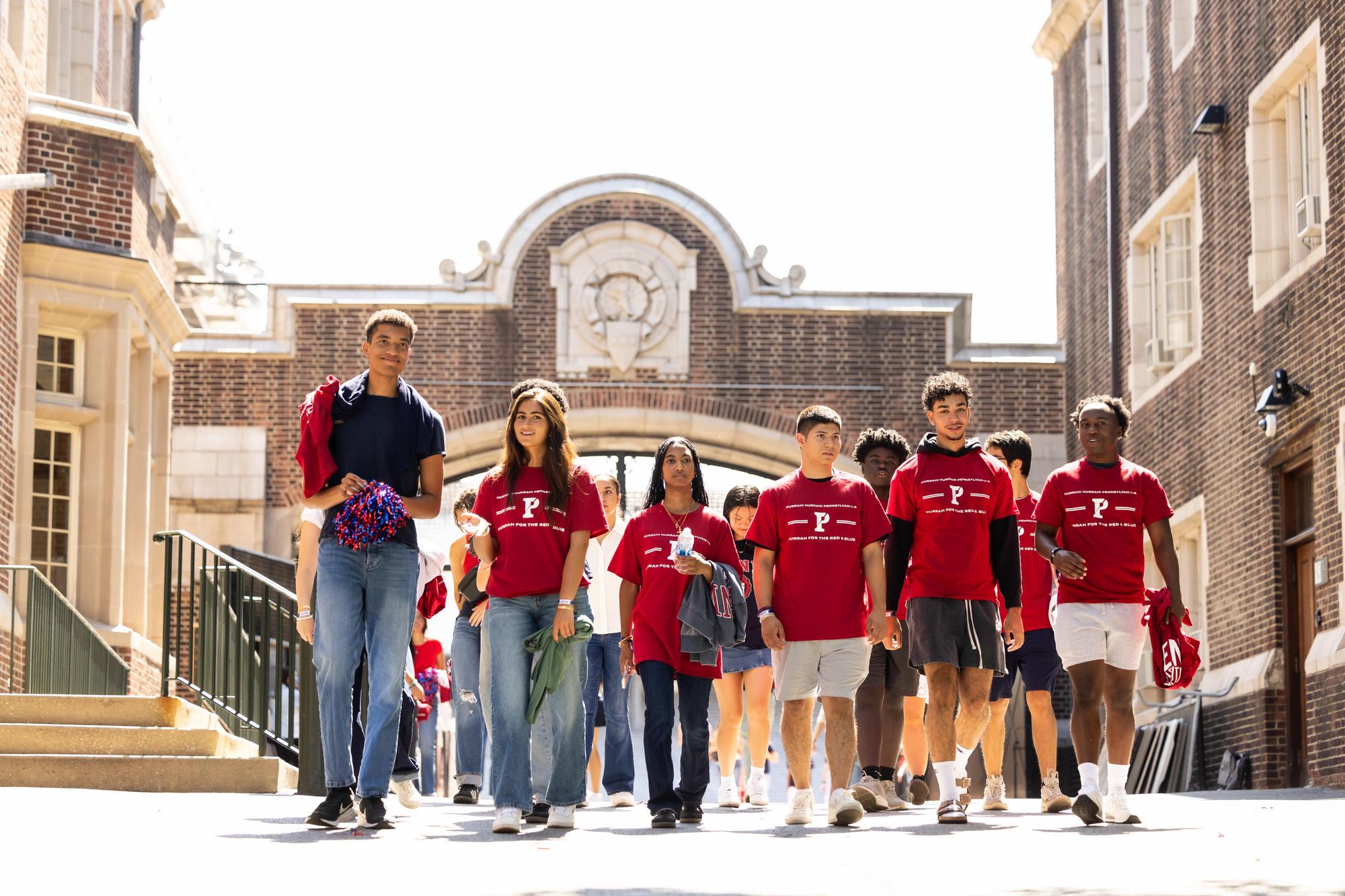 Several new Penn students walking into Franklin Field on NSO weekend.