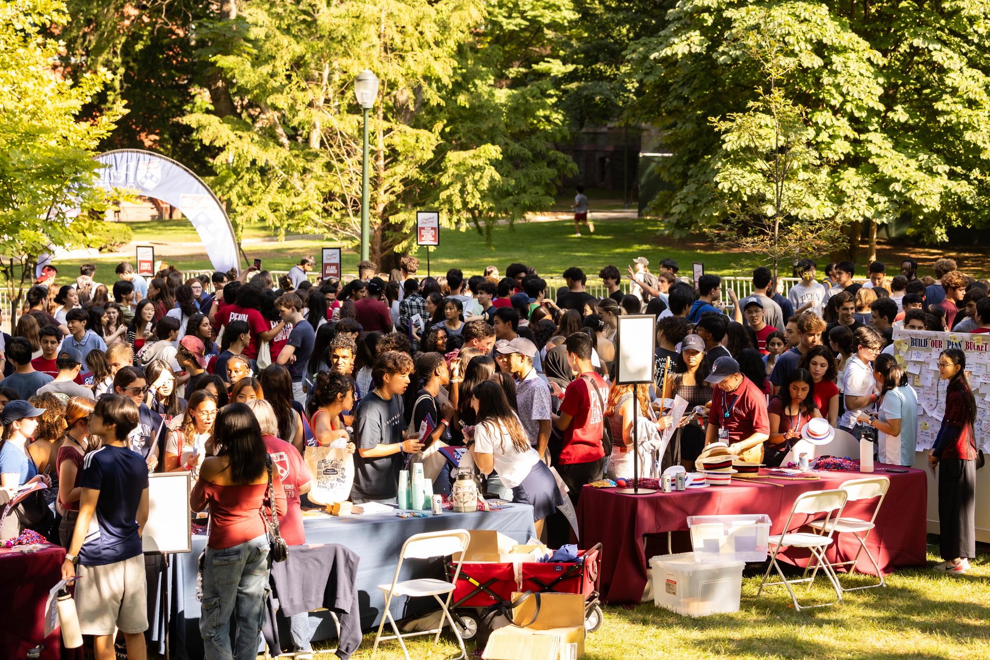 a crowd of new Penn students on College Green on NSO weekend.