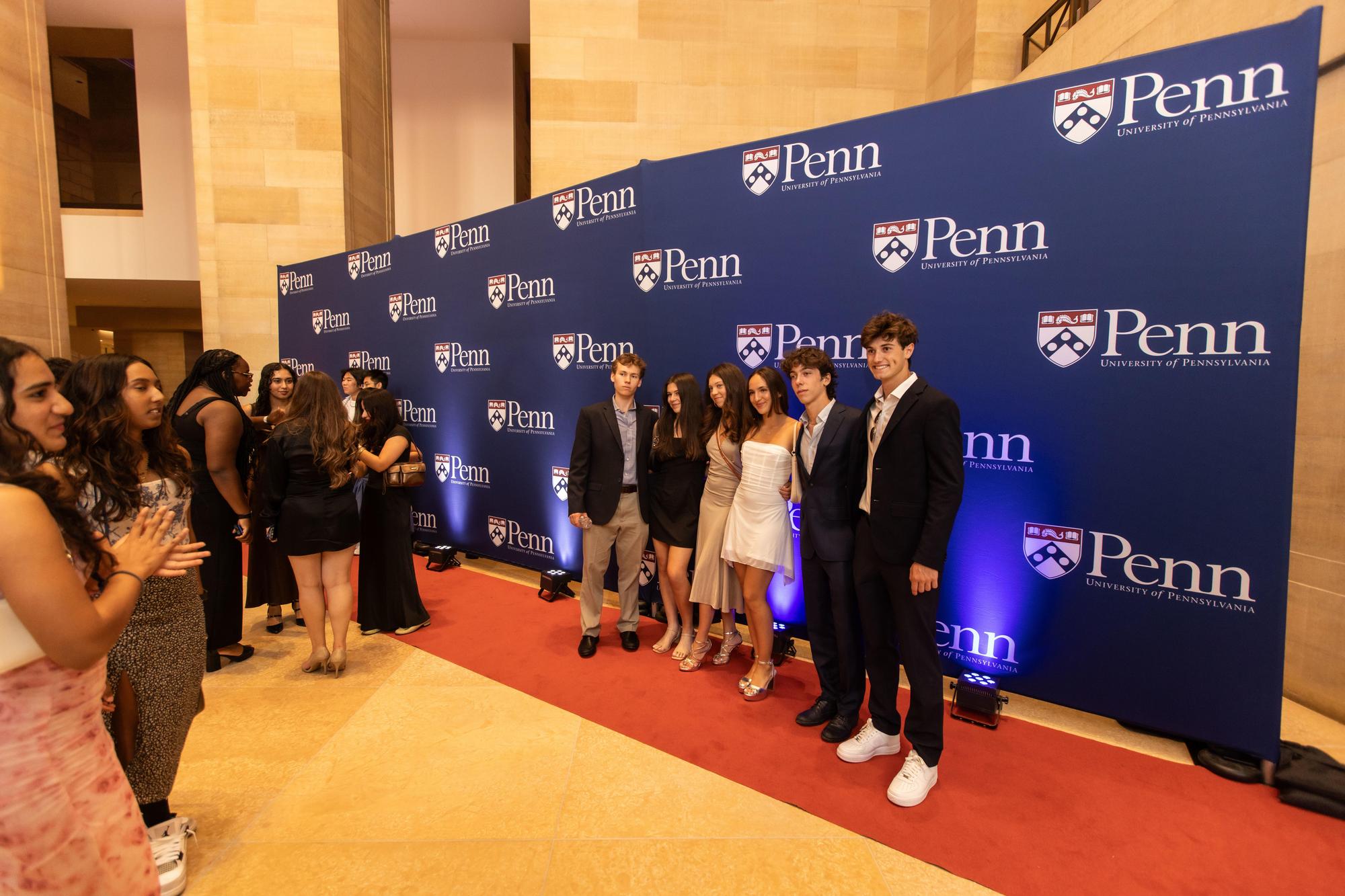 Six new Penn students in front of a Penn step-and-repeat at the Philly Art Musuem.