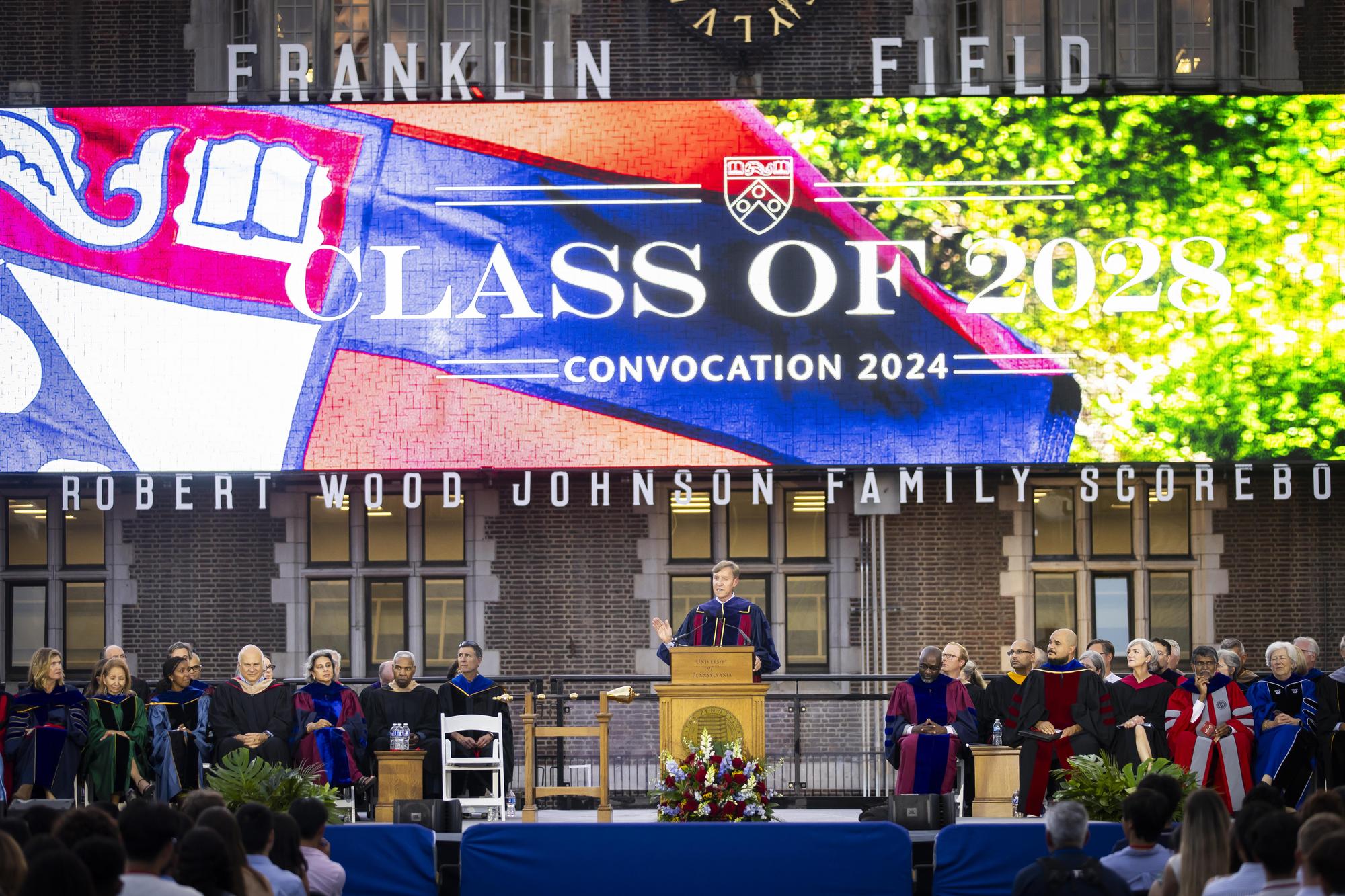 Penn President J. Larry Jameson at the podium on Franklin Field at Penn’s Convocation for the class of 2028.