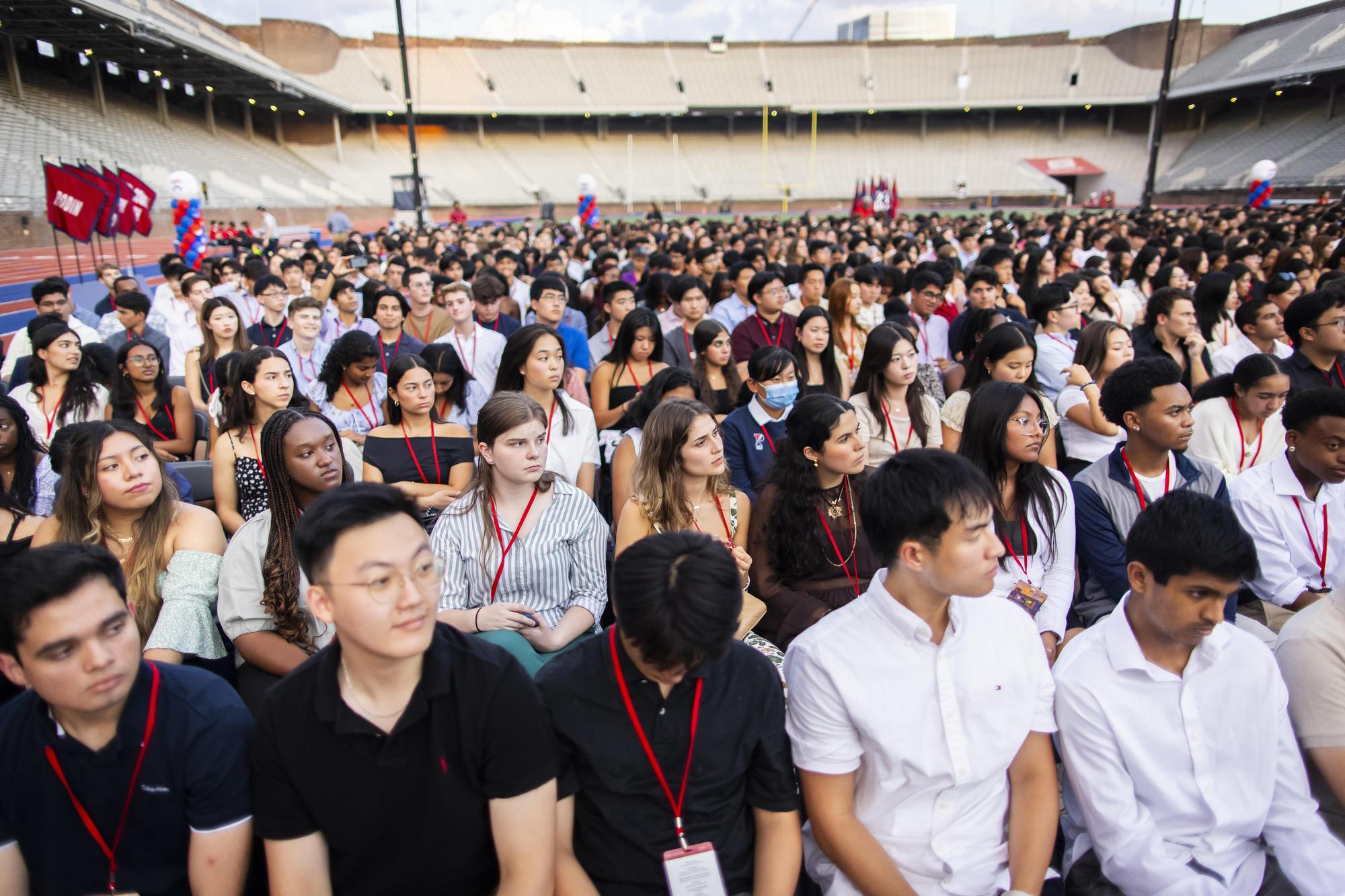 A crowd of new Penn students seated on Franklin Field for Penn’s Convocation for the Class of 2028.