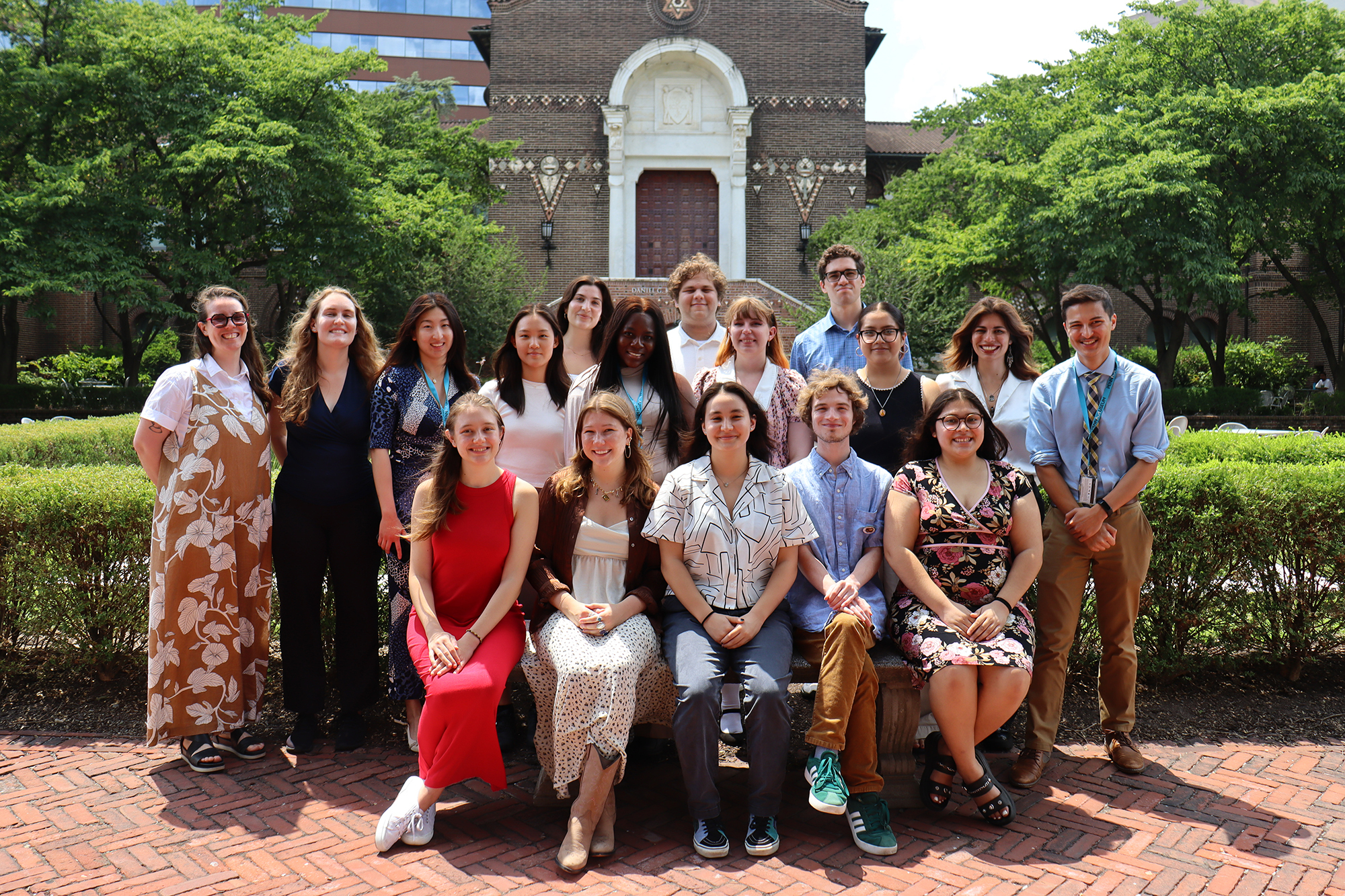 Seventeen Penn Museum interns posing in the garden. 