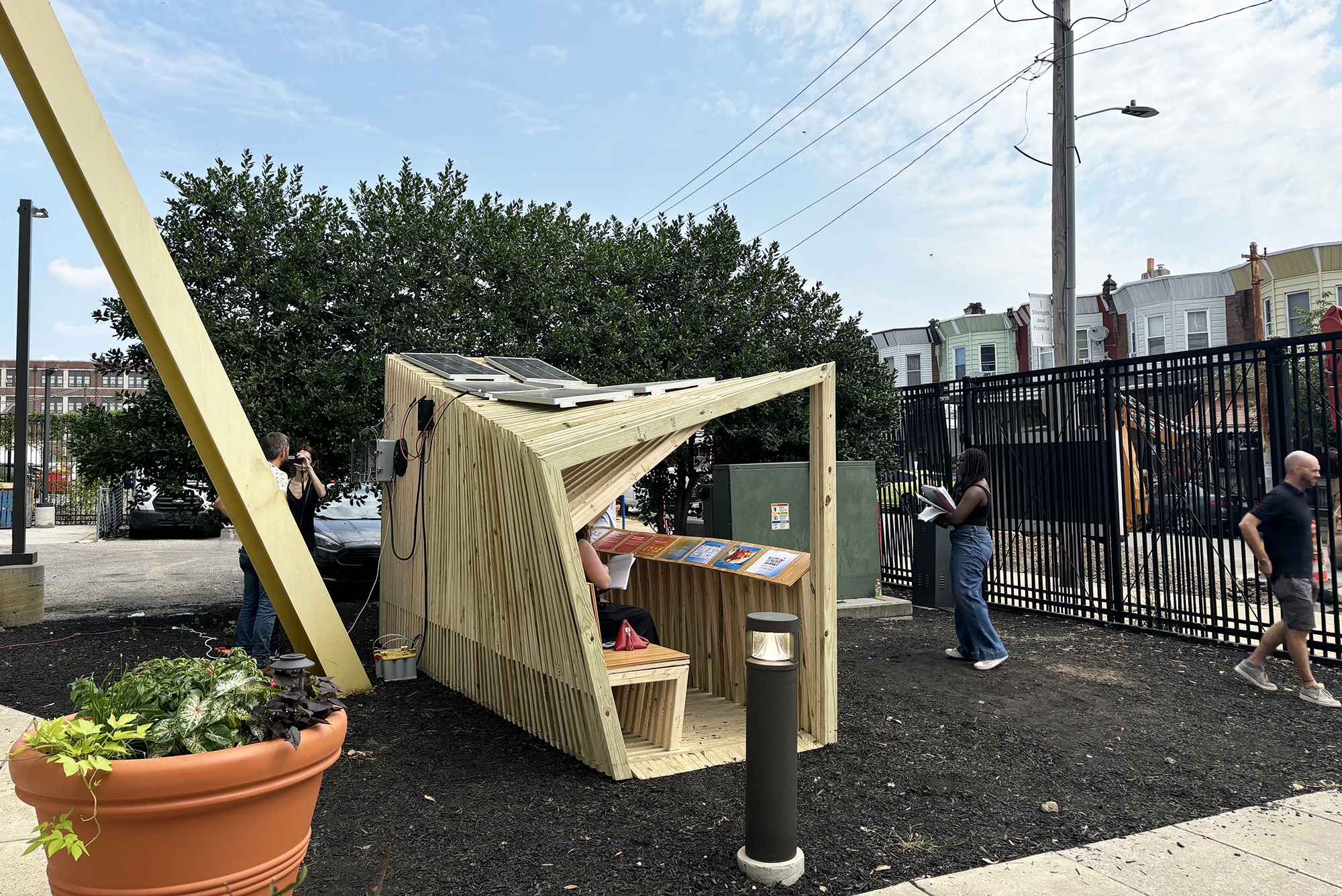 A wooden cooling shelter prototype in a Philly neighborhood.