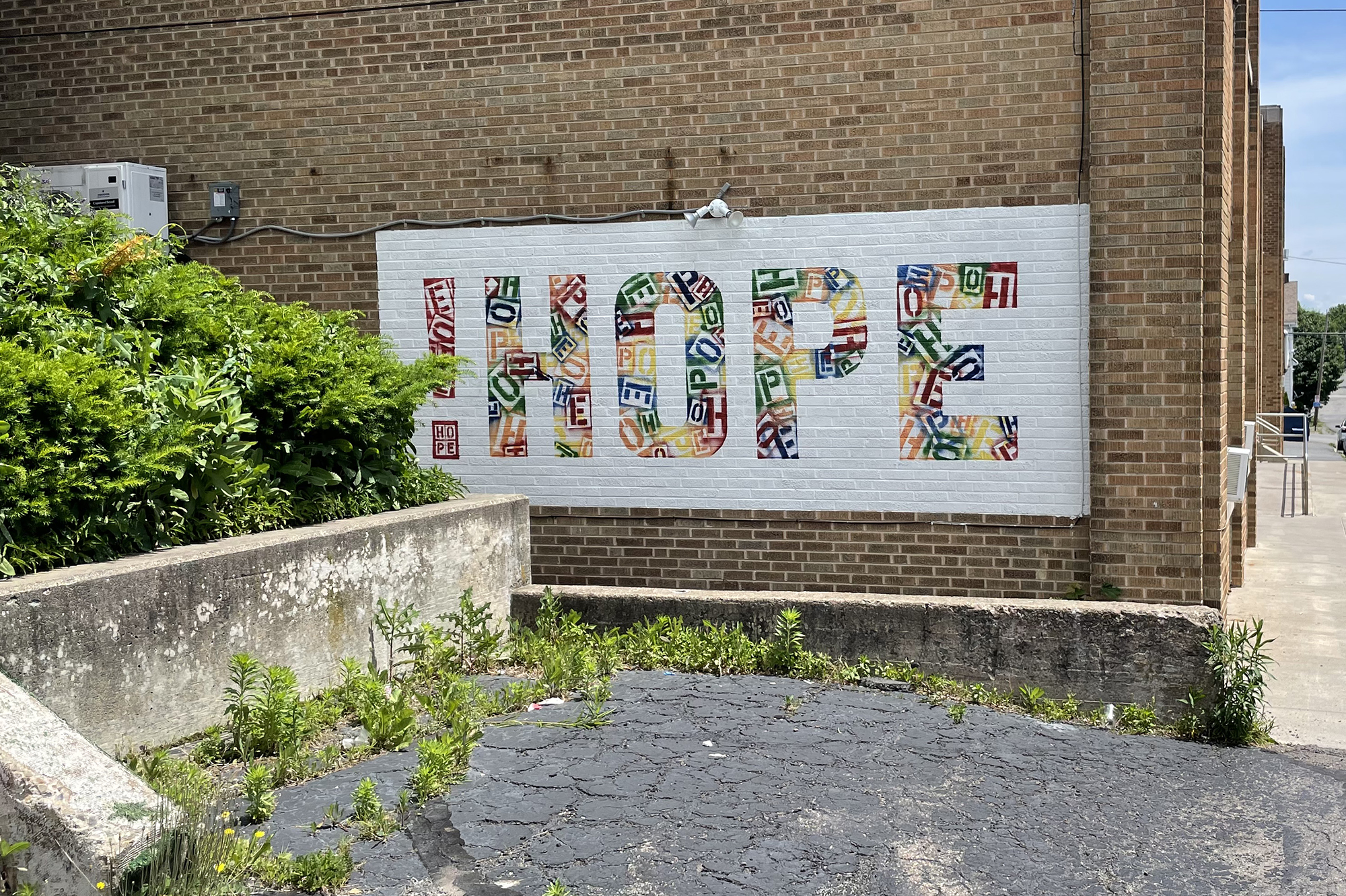 HOPE painted colorfully on the exterior of the Hazelton Integration Project.