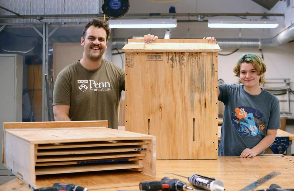 Nick Tanner and Daniel Flinchbaugh with a finished bat box.