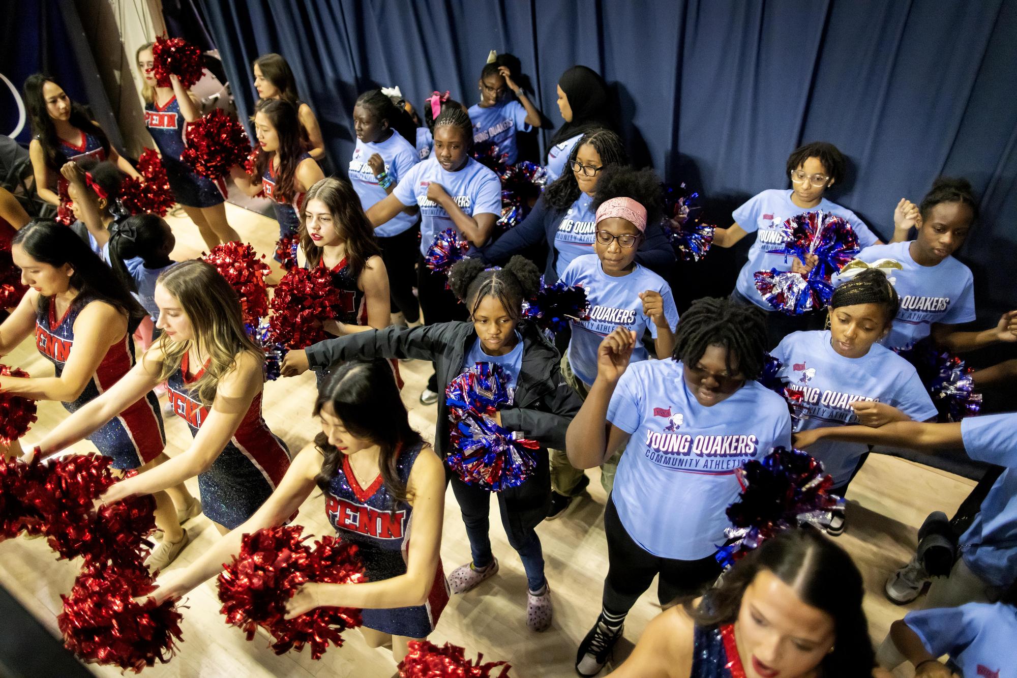 An overhead shot of the Quaker Girls and West Philadelphia students in uniform