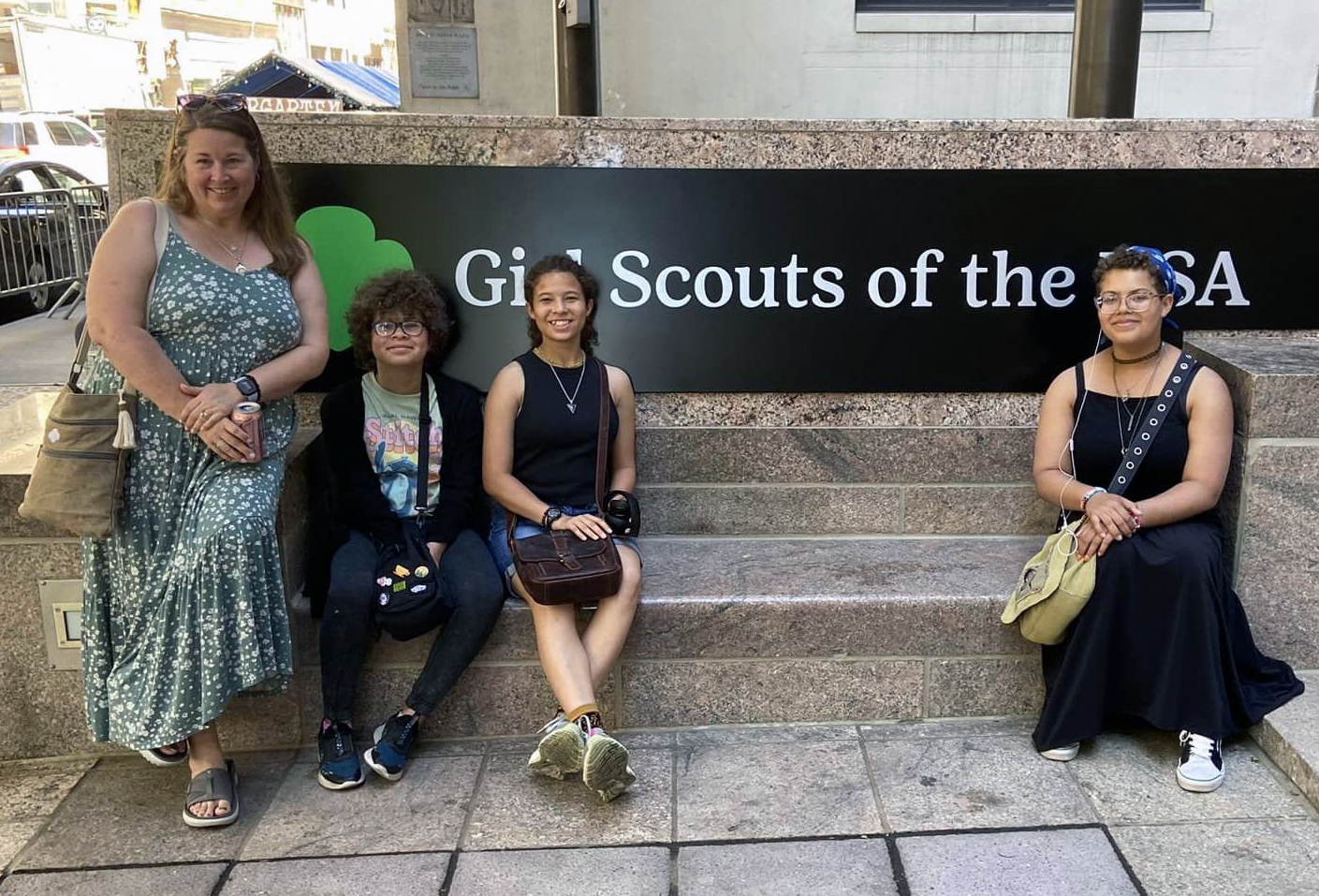 Heather Kelley-Thompson and members of her Girl Scout troop at Girl Scouts headquarters.