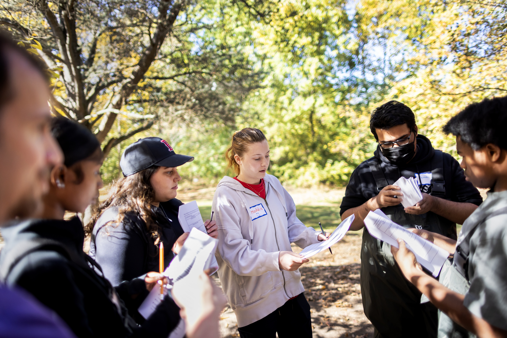 penn students and sayre students prep to evaluate water quality