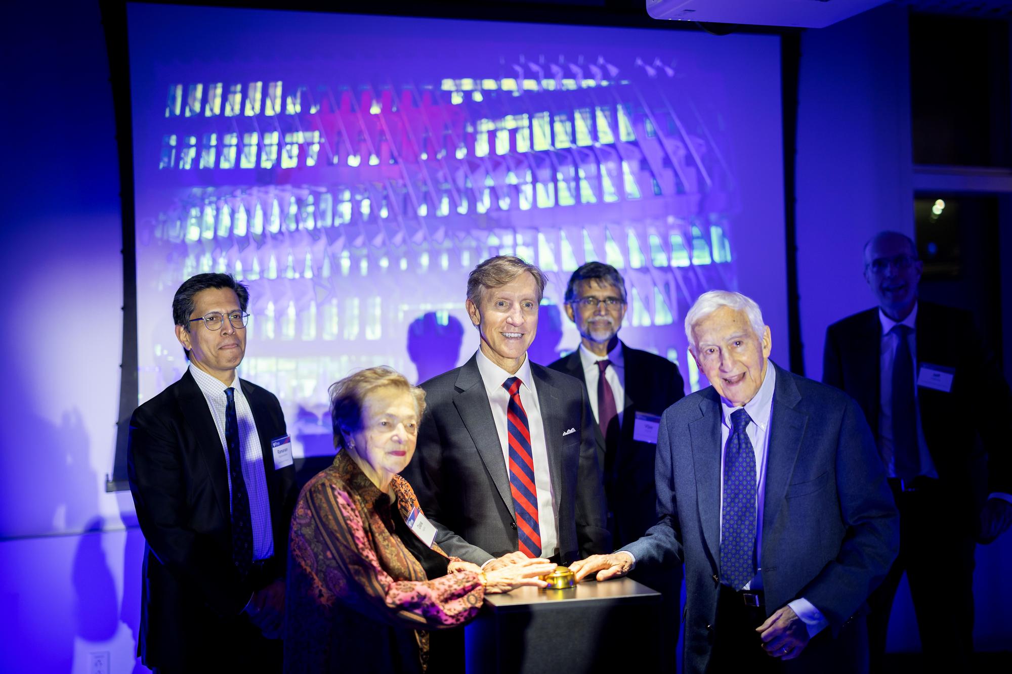 Penn Interim President J. Larry Jameson at the podium with P. Roy and Diana T. Vagelos, Ramanan Raghavendran and Vijay Kumar.n