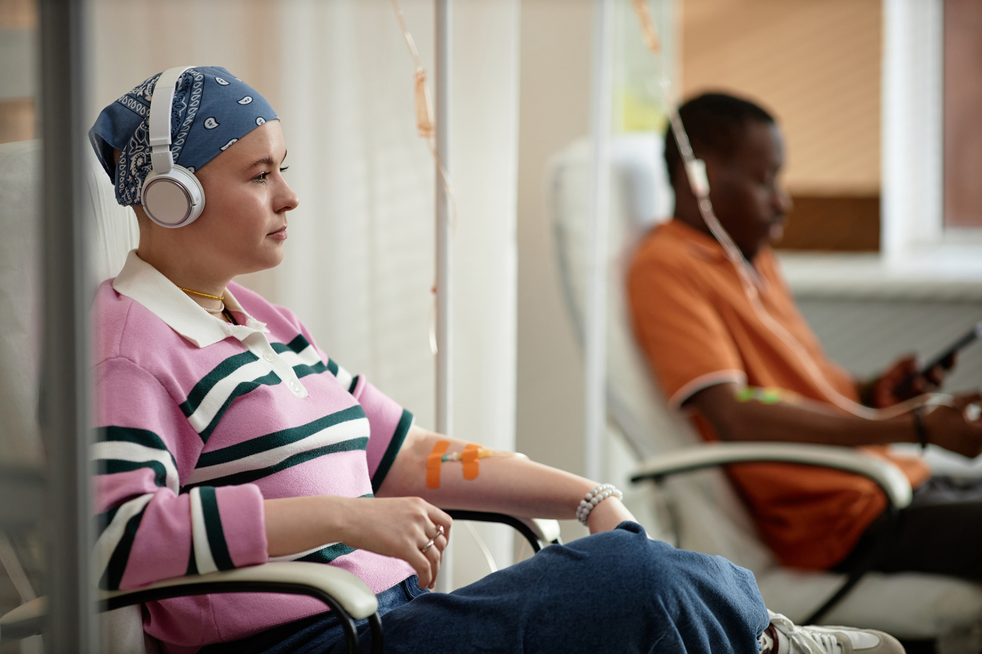 Two patients receiving chemotherapy.