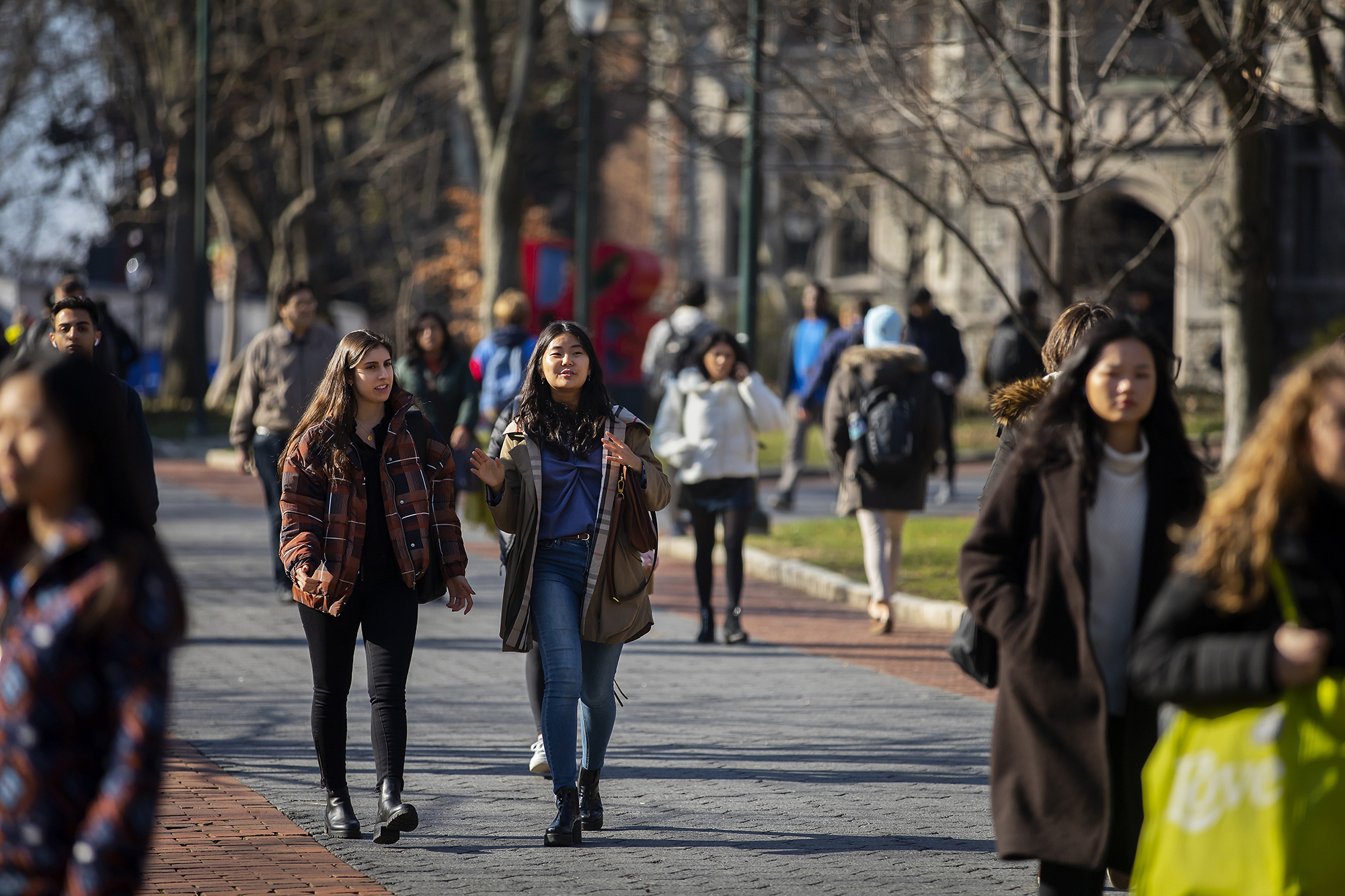 Penn students on Locust Walk in winter.