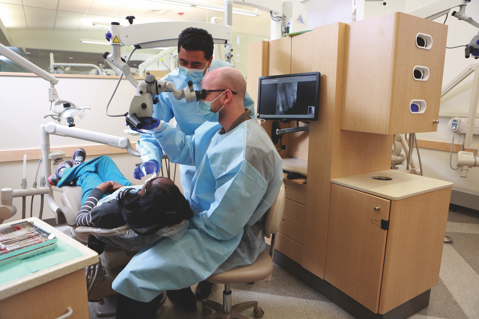 Person receiving treatment in a dental clinic.