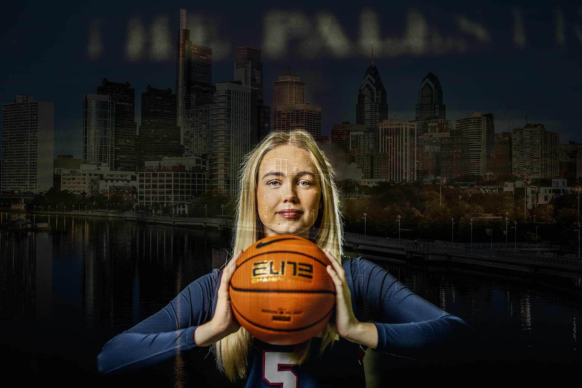 Stina Almqvist holds a ball while wearing her uniform.