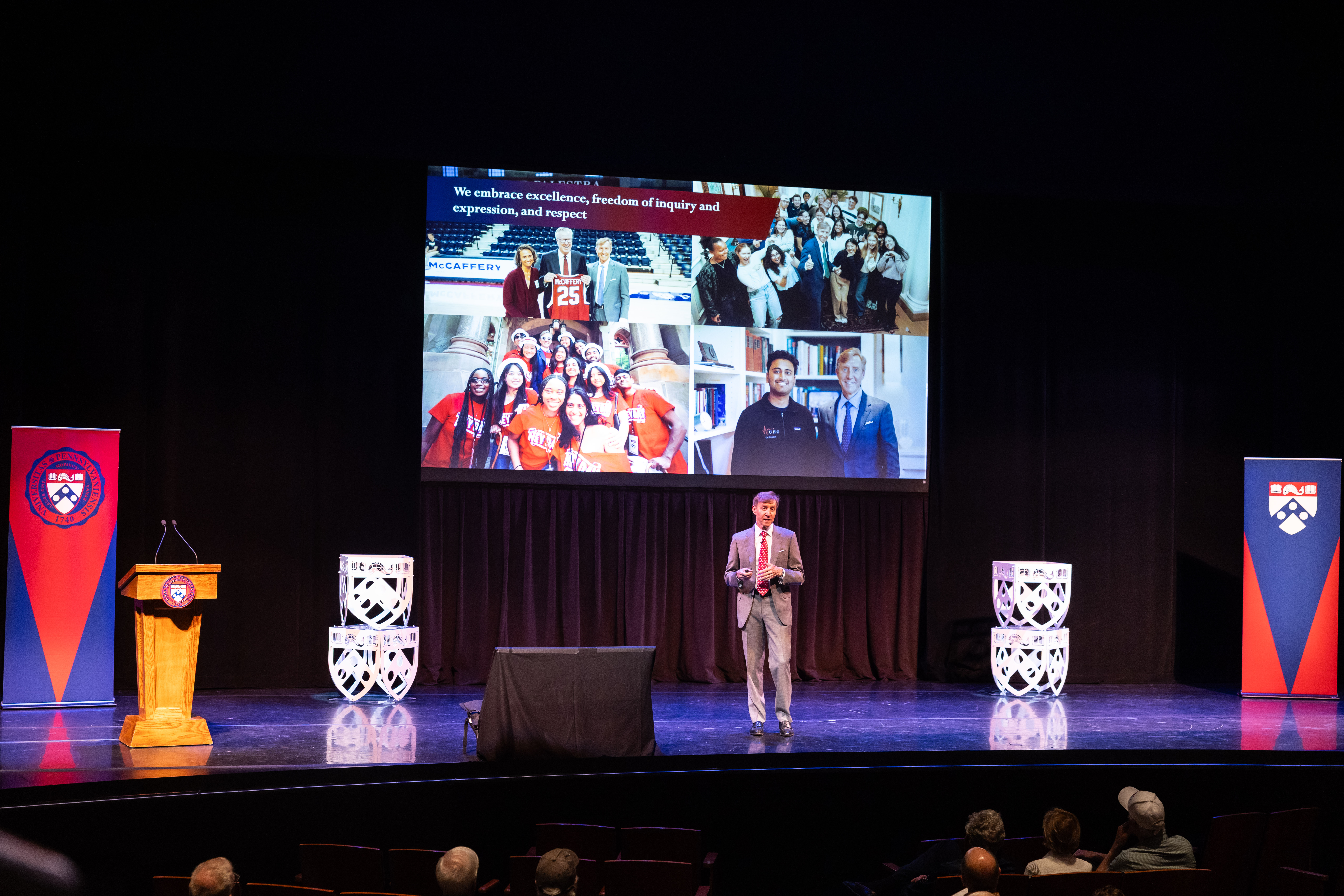 J. Larry Jameson speaking on stage.