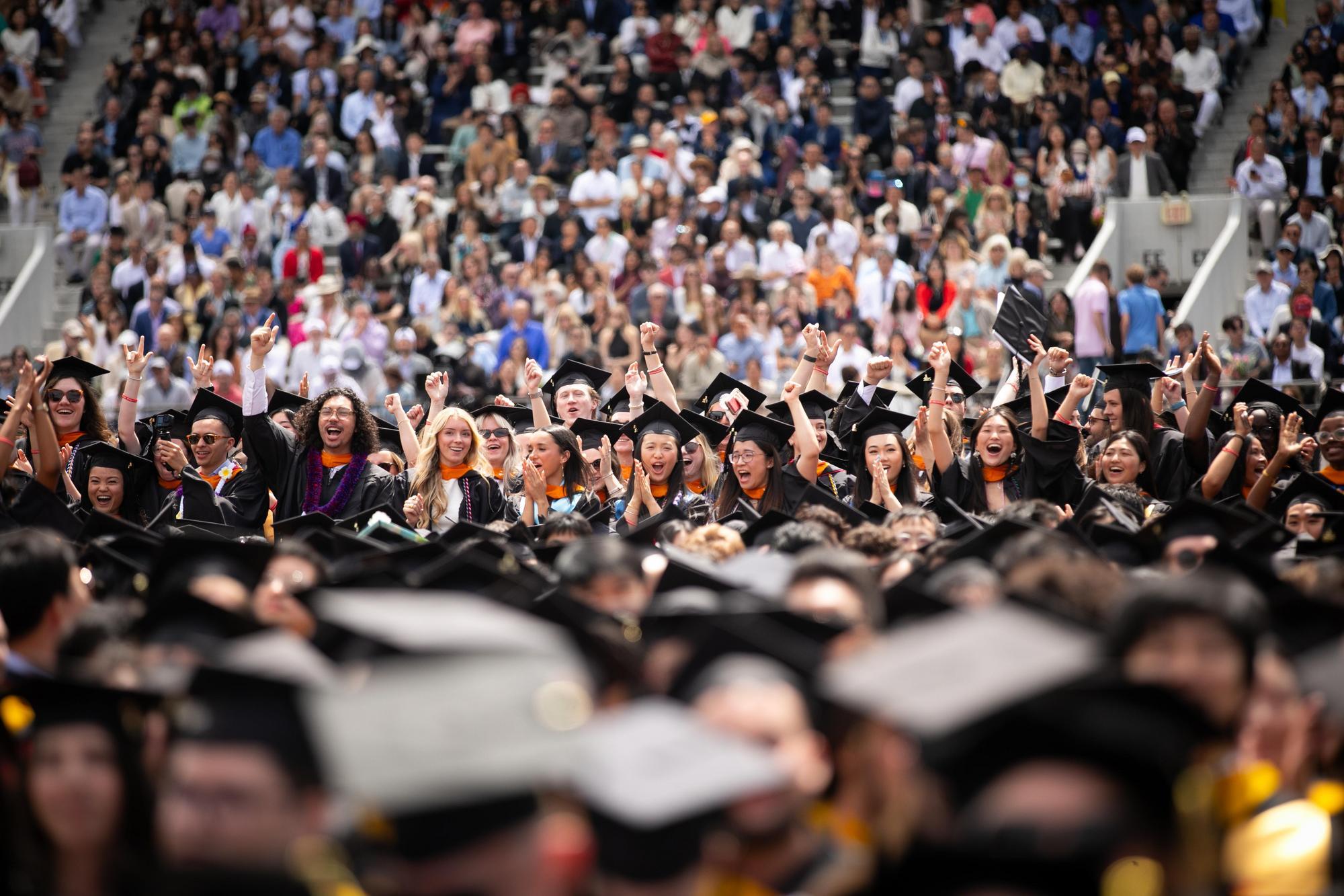 Graduates cheering at Penn’s 269th Commencement.
