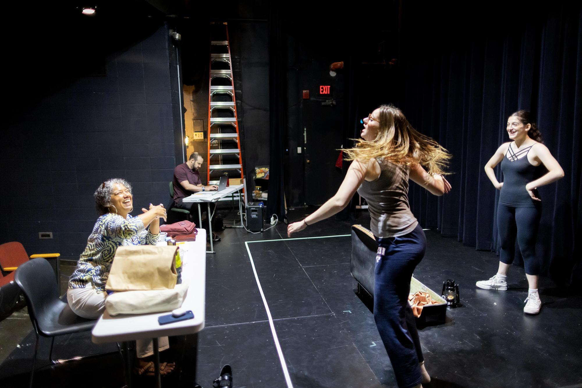 Margit Edwards, Pandora Schoen, and Anya Rothman rehearsing.