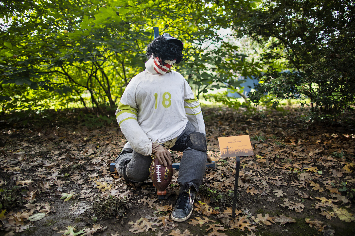 Colin-Kaepernick-Scarecrow-Bending-a-Knee-in-Leaves