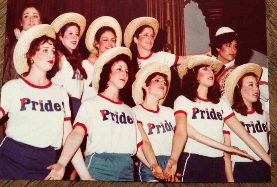 Female-performers-wearing-hats-on-stage