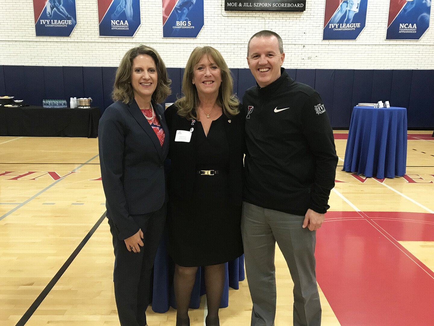 AD Calhoun and women's basketball coach and guest at reception